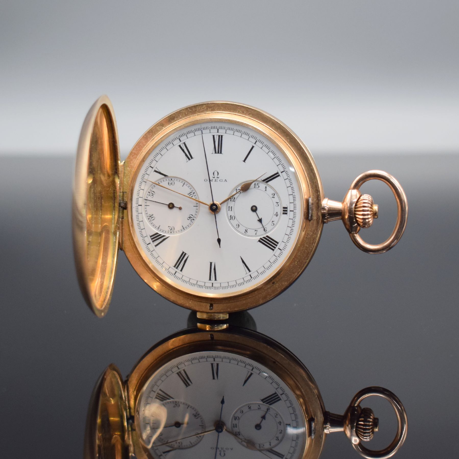 OMEGA Herrensavonette mit Chronograph in RoséG 585/000, Schweiz um 1915, 3 Deckel- Goldgeh. l. dell., Emailzifferbl. m. röm. Zahlen, gold. & gebl. ...