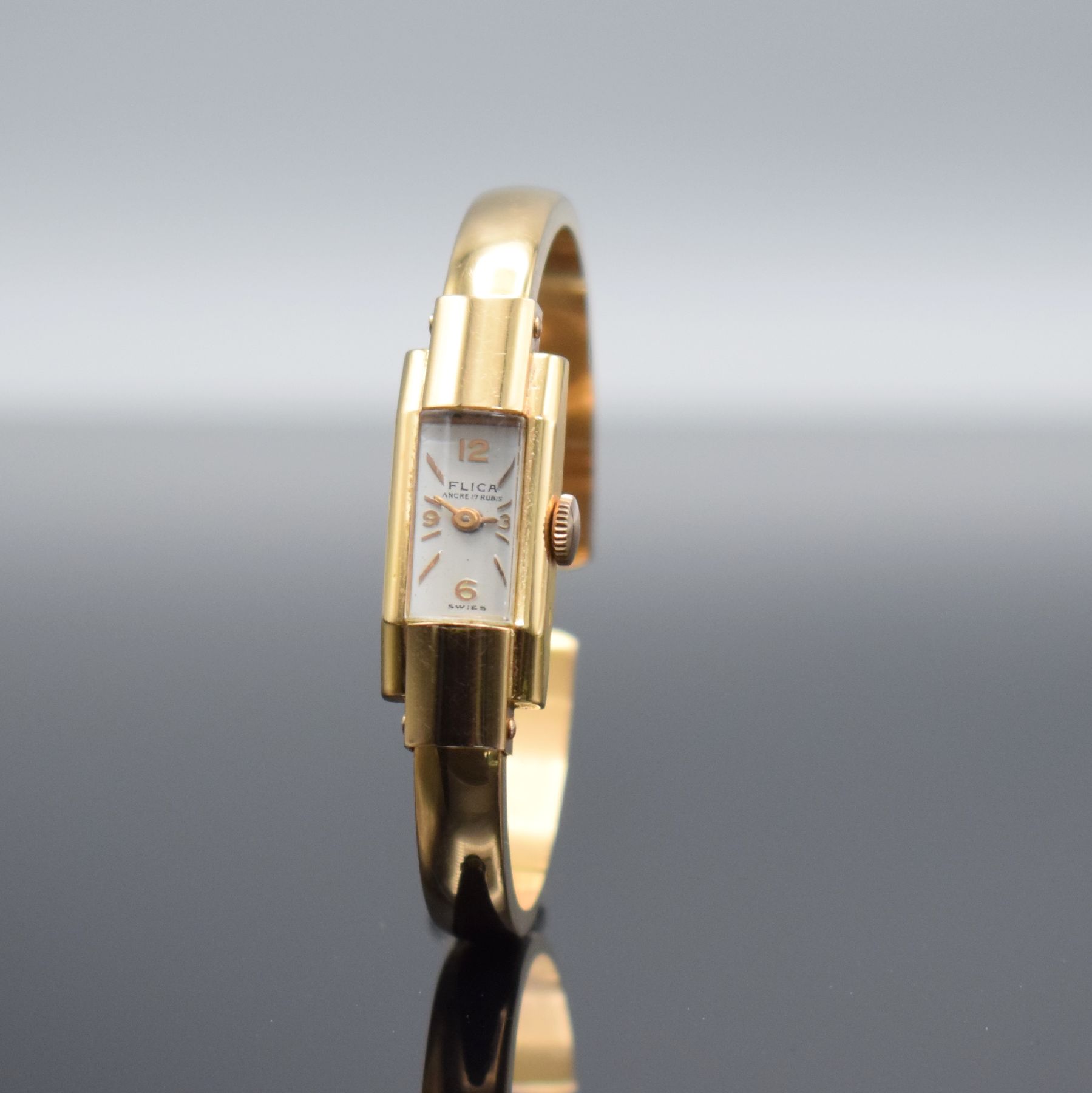 Detail a: FLICA Damenspangenuhr in RoséG 750/000, Schweiz um 1940, Handaufzug, Boden aufgedr., silb. Zifferbl. m. gold. Ind. & arab. Zahlen, gold. Zeiger, ...