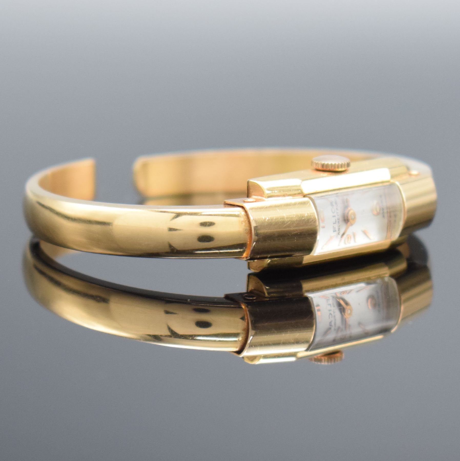 Detail c: FLICA Damenspangenuhr in RoséG 750/000, Schweiz um 1940, Handaufzug, Boden aufgedr., silb. Zifferbl. m. gold. Ind. & arab. Zahlen, gold. Zeiger, ...
