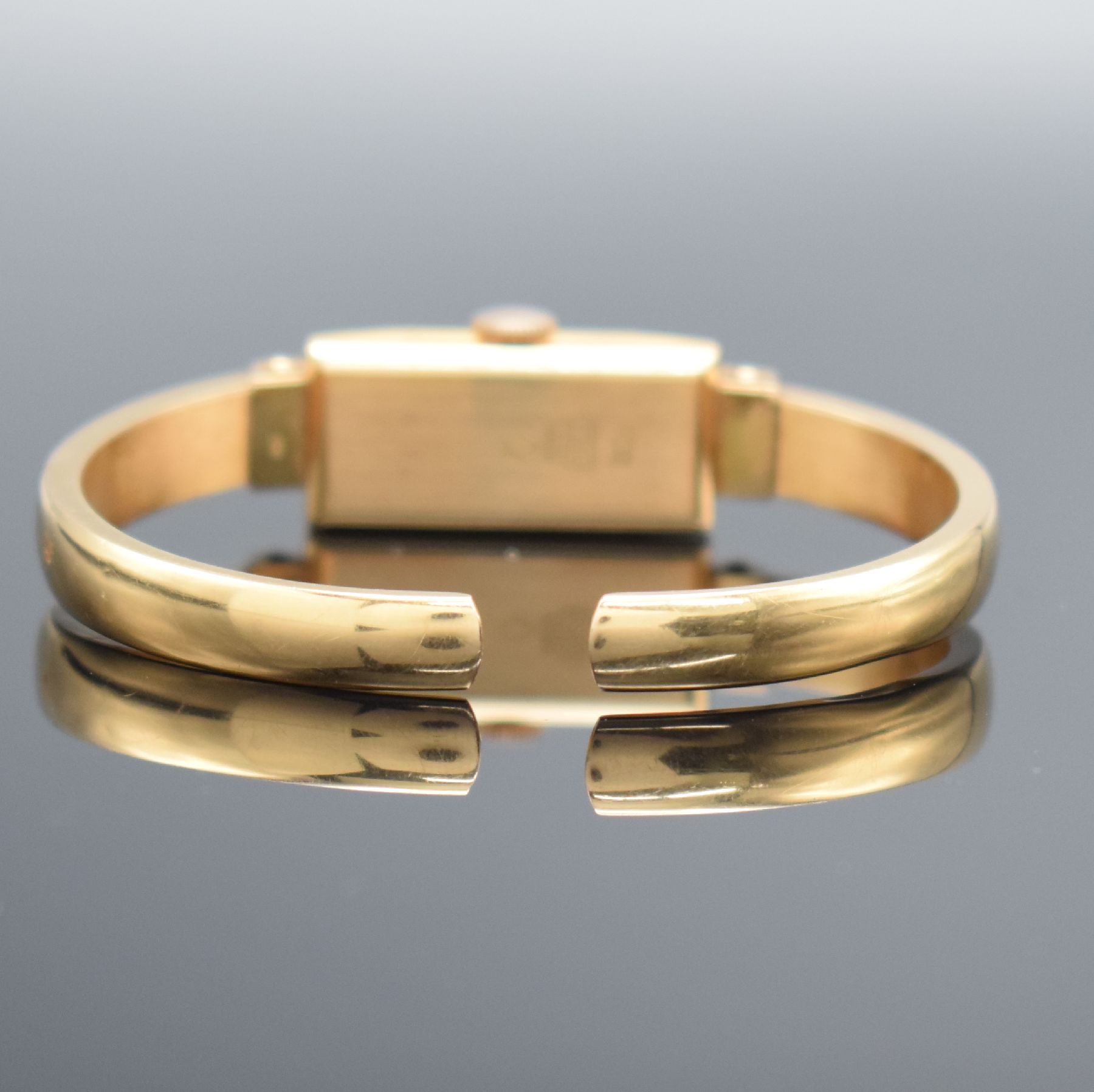 Detail d: FLICA Damenspangenuhr in RoséG 750/000, Schweiz um 1940, Handaufzug, Boden aufgedr., silb. Zifferbl. m. gold. Ind. & arab. Zahlen, gold. Zeiger, ...