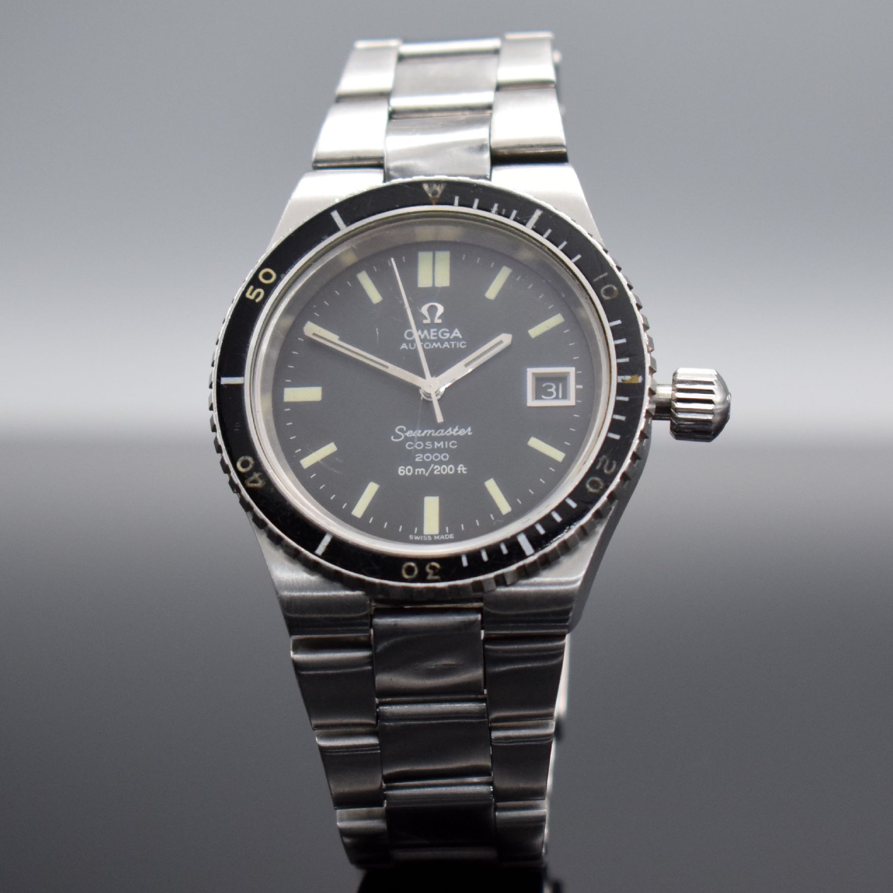 Detail b: OMEGA Seamaster Cosmic 2000 seltene Herrenarmbanduhr in Stahl/Stahlband, Schweiz um 1972, Automatik, Spezial Monocoque-Geh., schwarze Drehlünette m. ...