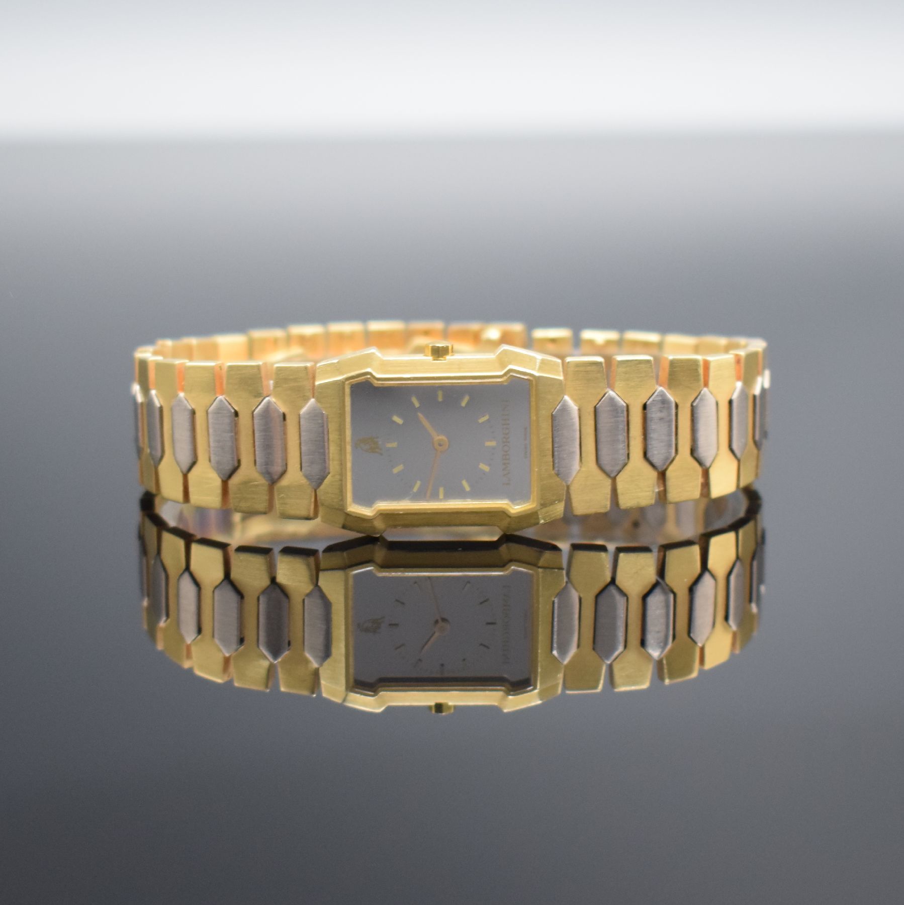 LAMBORGHINI Damenarmbanduhr in GG 750/000, Schweiz um 1980, quarz, Boden 8-fach verschr., orig. Gliederband in GG & WG 750/000, Spiegel-Zifferbl. m. ...