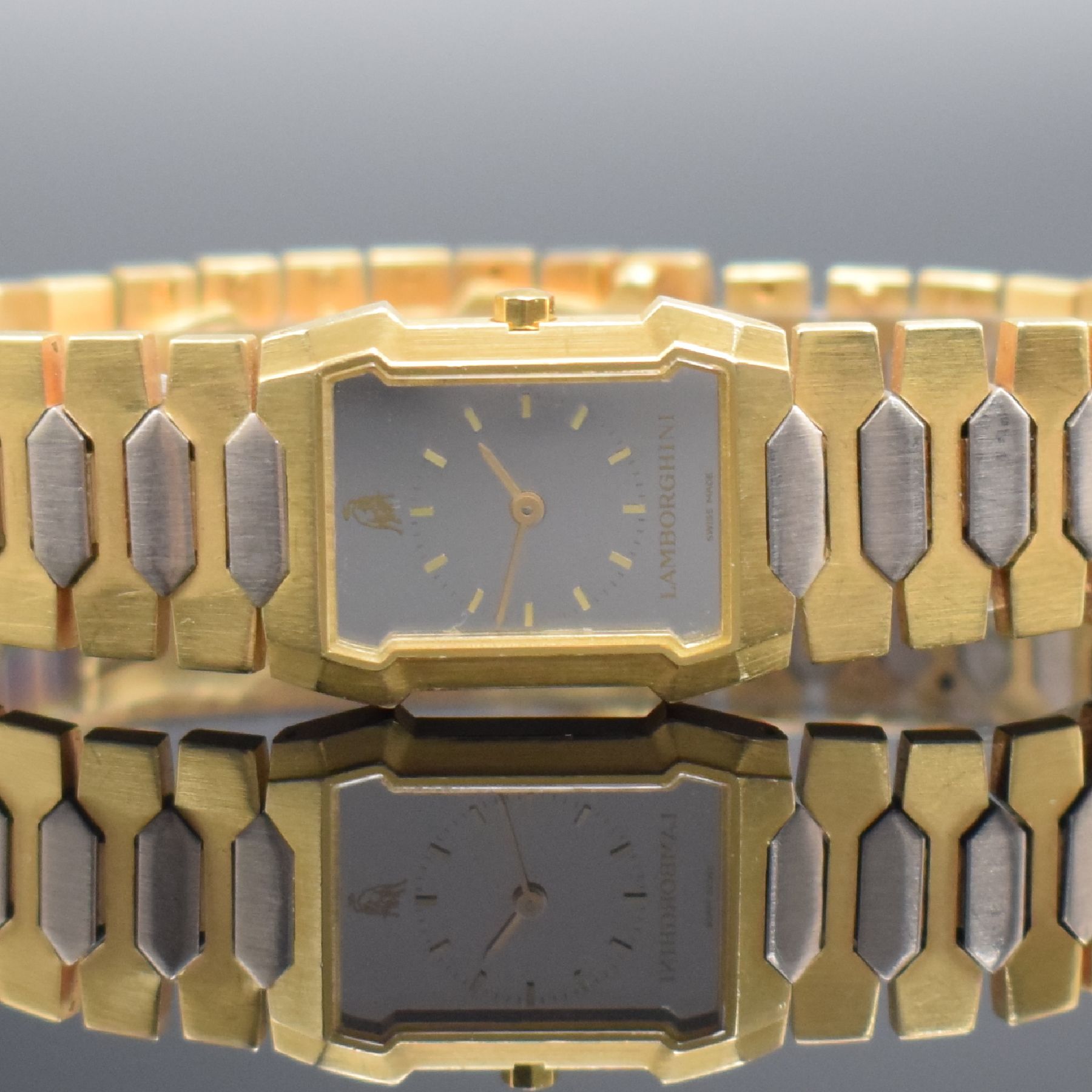 Detail a: LAMBORGHINI Damenarmbanduhr in GG 750/000, Schweiz um 1980, quarz, Boden 8-fach verschr., orig. Gliederband in GG & WG 750/000, Spiegel-Zifferbl. m. ...