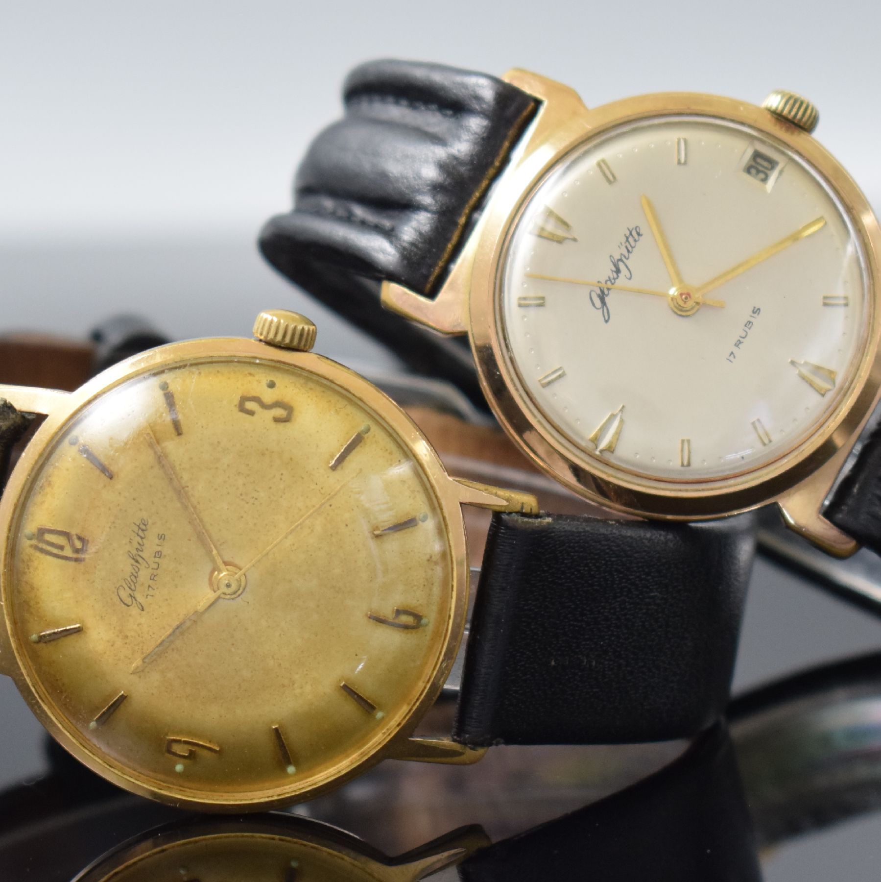 Detail a: GLASHÜTTE 2 vergoldete Armbanduhren, Deutschland um 1960-1970, Handaufzug, Böden gedr., 1.) silb. Zifferbl. m. gold. Ind. & Zeigern rest., Datum b. ...
