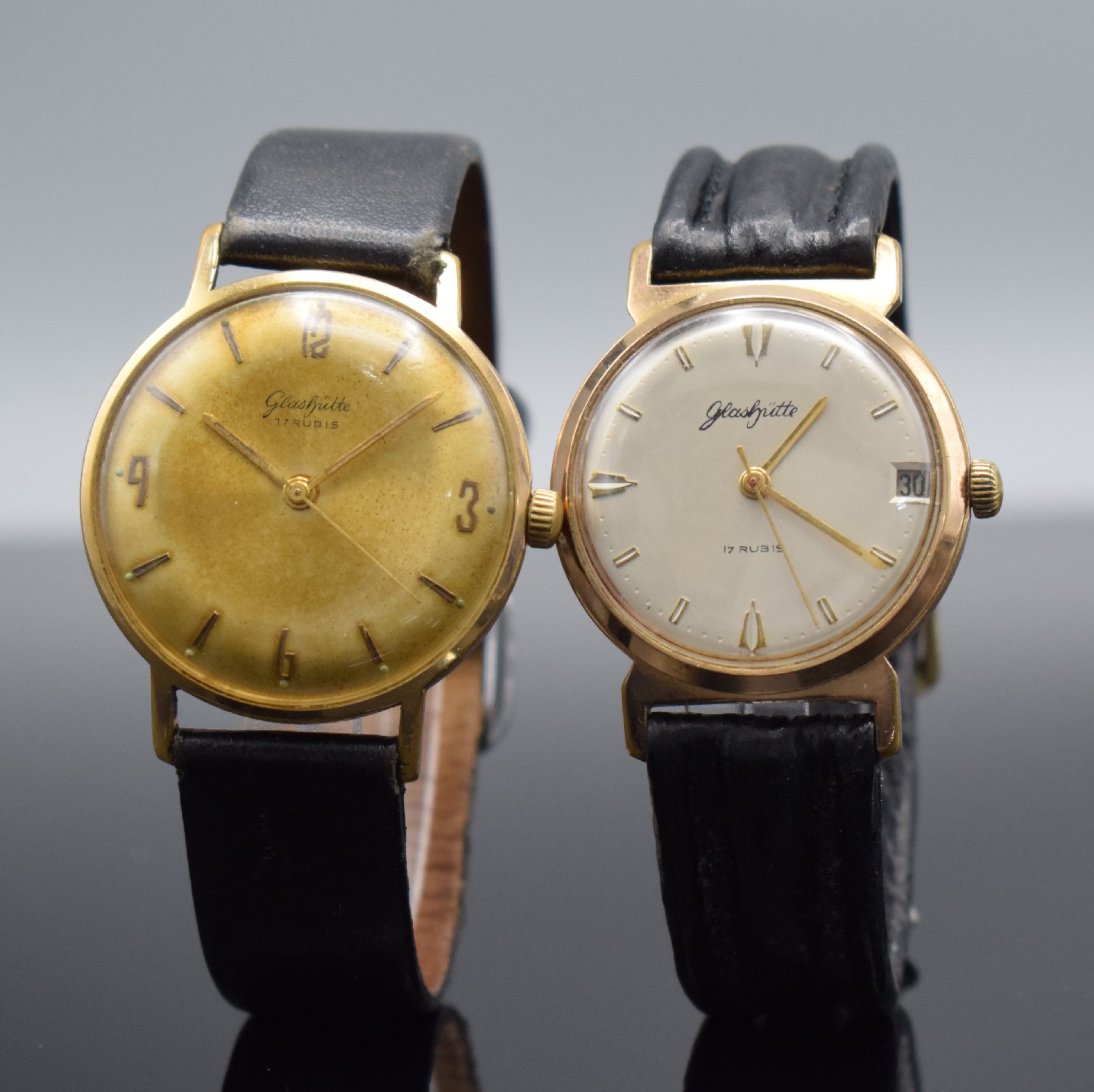 Detail b: GLASHÜTTE 2 vergoldete Armbanduhren, Deutschland um 1960-1970, Handaufzug, Böden gedr., 1.) silb. Zifferbl. m. gold. Ind. & Zeigern rest., Datum b. ...