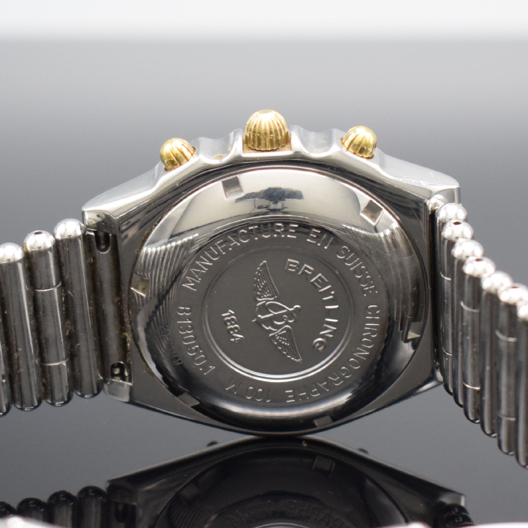 Detail c: BREITLING Chronomat Herrenarmbanduhr mit Chronograph Referenz B13050.1, Schweiz um 1999, Automatik, verschr. Gehäuse in Edelstahl/Gold, eins. rast. ...