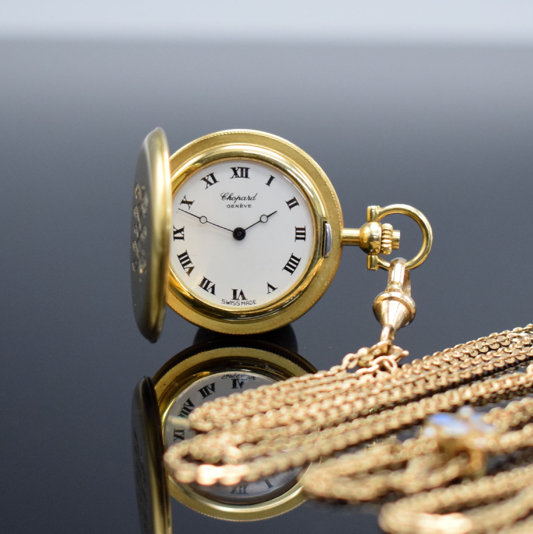 CHOPARD Damensavonette in GG 750/000 mit Kette in RoseG 585/000, Schweiz um 1985, Ref. 3015, Kette um 1900, 2-teil. Gehäuse mit Münzrand, ...