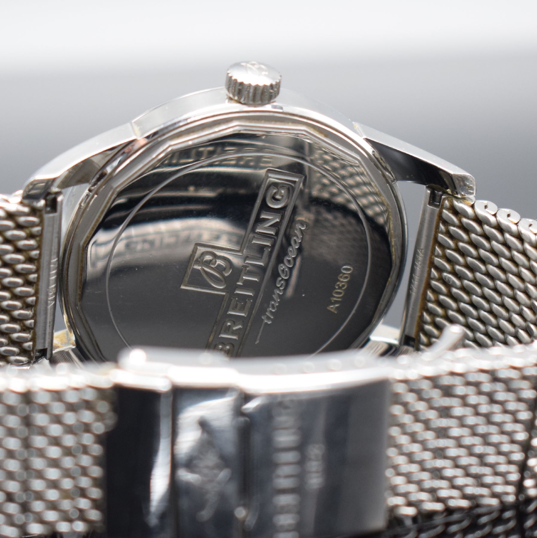 Detail c: BREITLING Transocean Herrenarmbanduhr in Edelstahl Referenz A10360, Schweiz um 2012, Automatik, großes Gehäuse, Boden geschr., orig. Milanaiseband ...