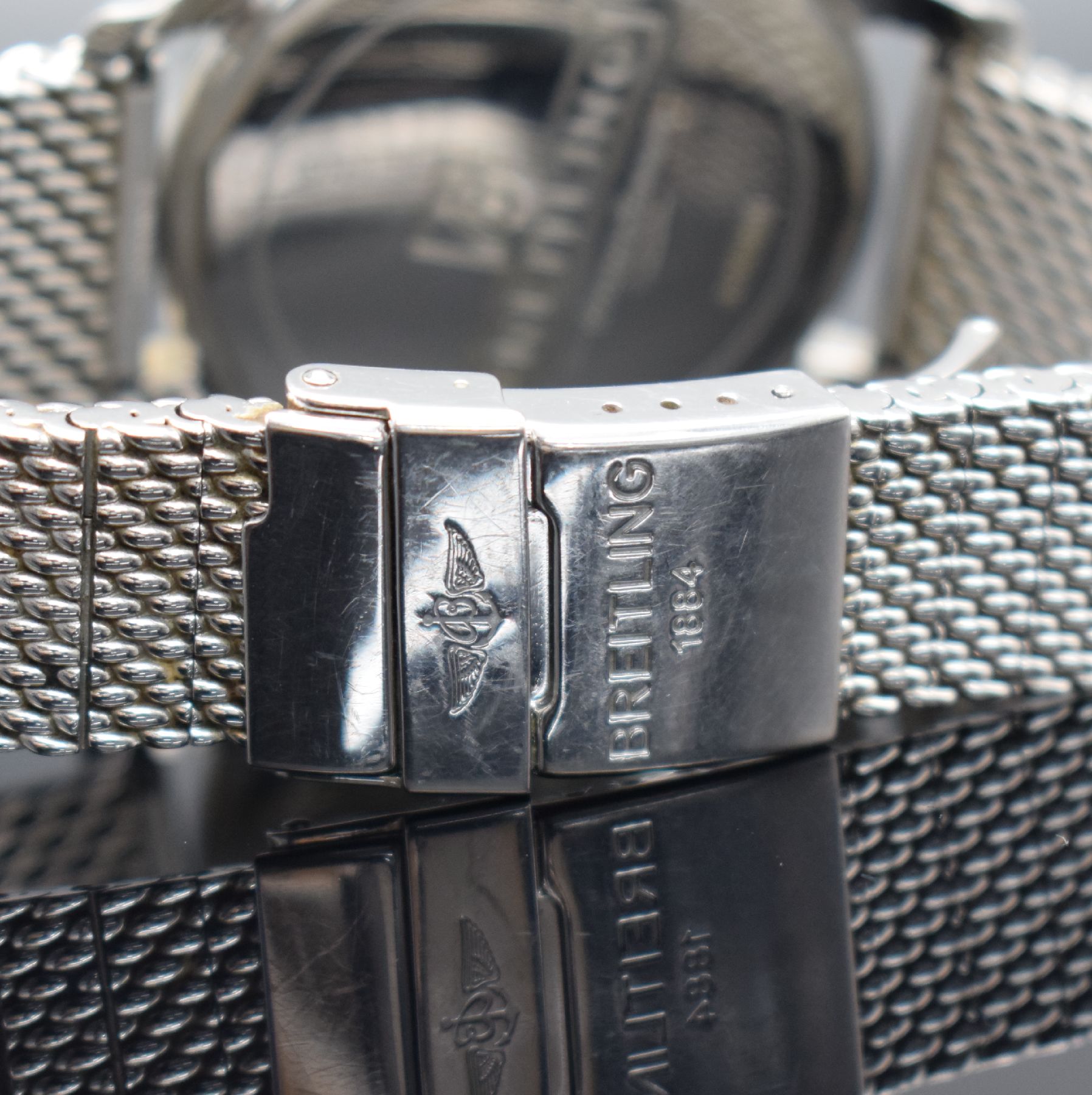Detail d: BREITLING Transocean Herrenarmbanduhr in Edelstahl Referenz A10360, Schweiz um 2012, Automatik, großes Gehäuse, Boden geschr., orig. Milanaiseband ...