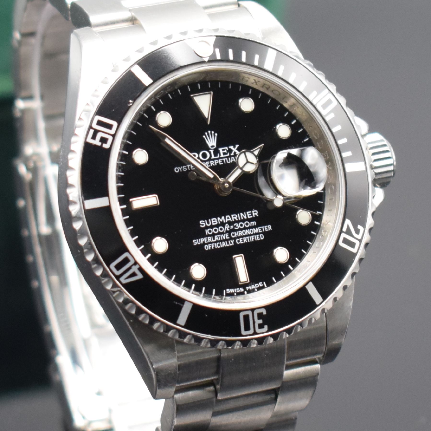 Detail e: ROLEX Oyster Perpetual Date Submariner Herrenarmbanduhr Referenz 16610 T, Schweiz um 2007, Chronometer der Superlative in Edelstahl inkl. Oysterband ...