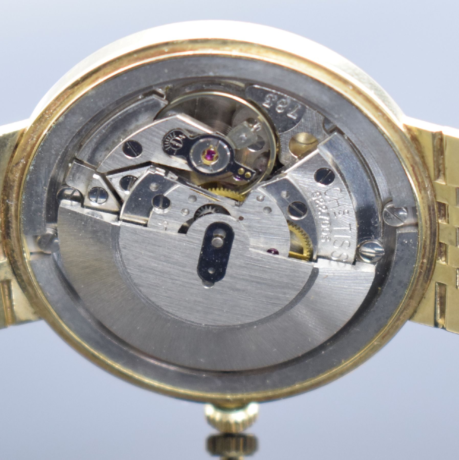 Detail i: TISSOT Herrenarmbanduhr in GG 585/000, Schweiz um 1965, Automatik, 2-teil. Geh., Boden aufgedr., orig. GG 585/000 Band, silb. Zifferbl. m. aufges. ...