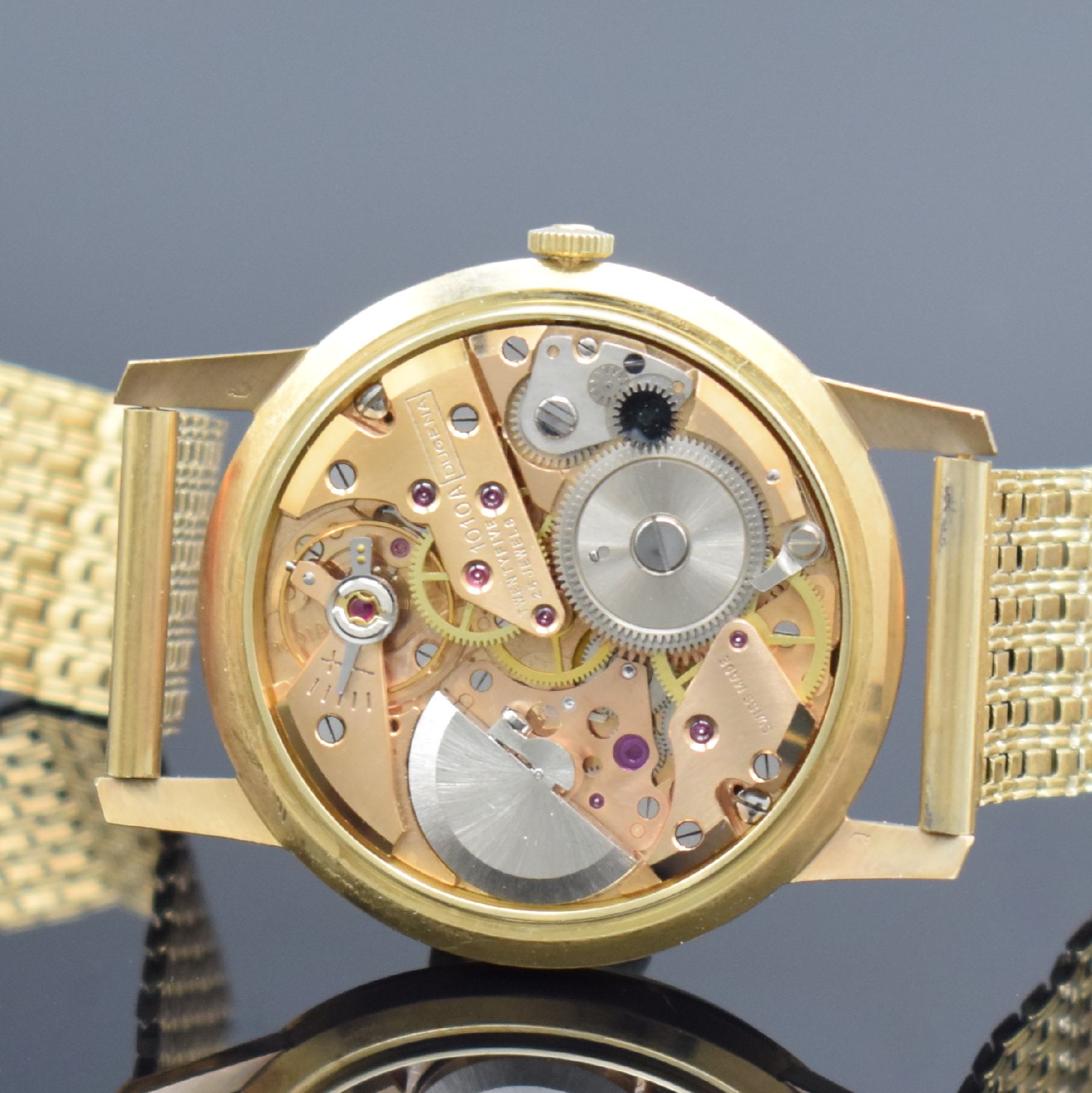 Detail g: DUGENA Herrenarmbanduhr in GG 585/000 mit Microrotor Kaliber 1010A inklusive GG 585/000 Band, Schweiz um 1960, Automatik, 3-teil. Geh., Boden & ...