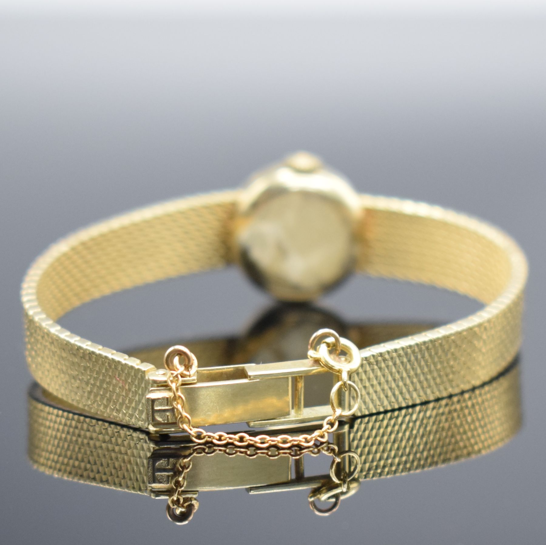 Detail d: TISSOT Damenarmbanduhr in GG 585/000 mit GG 585/000 Goldband, Schweiz um 1960, Handaufzug, 2-teil. Geh., Boden aufgedr., orig. Milanaiseband, verg. ...