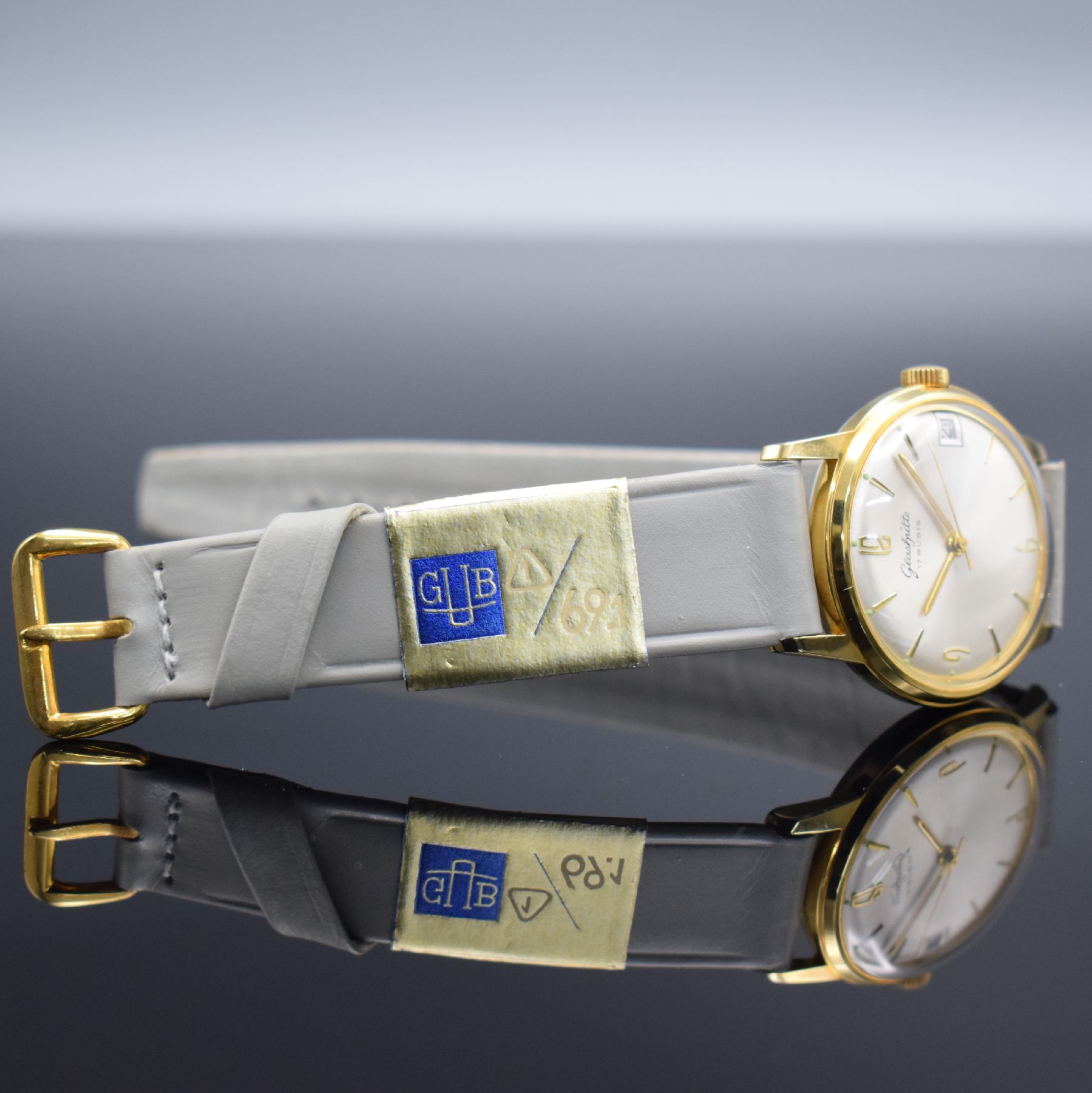Detail d: GLASHÜTTE Kaliber 69.1 neuwertige Armbanduhr mit original Box & Papier, DDR um 1965, Handaufzug, verg. Geh. m. gedr. Stahlboden, silb. Zifferbl., ...