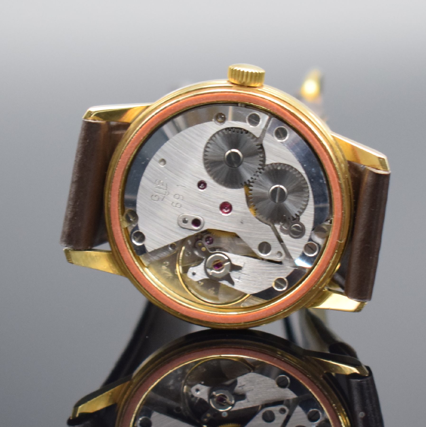 Detail e: GLASHÜTTE Kaliber 69.1 neuwertige Armbanduhr mit original Box & Papier, DDR um 1965, Handaufzug, verg. Geh. m. gedr. Stahlboden, silb. Zifferbl., ...