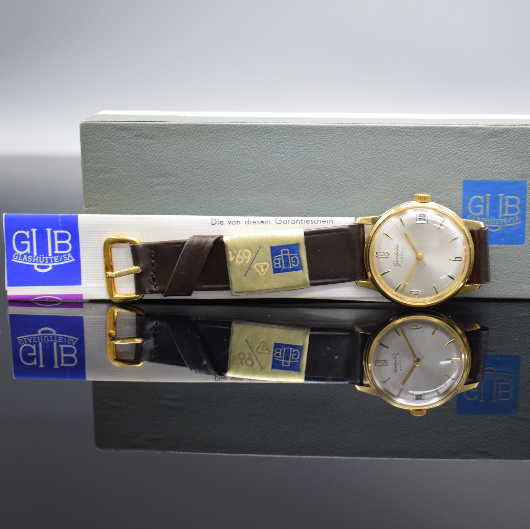 Detail g: GLASHÜTTE Kaliber 69.1 neuwertige Armbanduhr mit original Box & Papier, DDR um 1965, Handaufzug, verg. Geh. m. gedr. Stahlboden, silb. Zifferbl., ...
