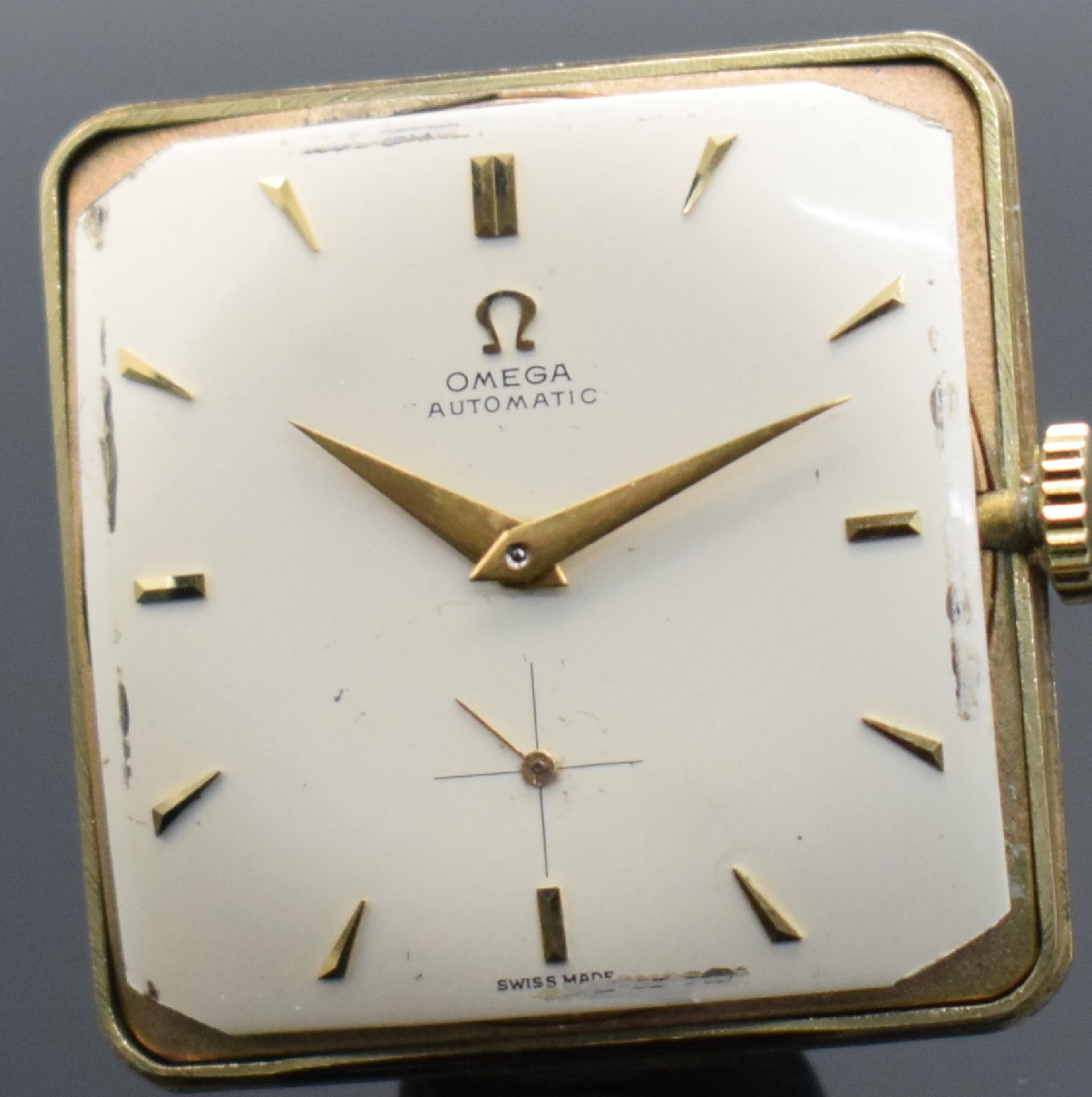 Detail h: OMEGA Referenz 3903 quadratische Armbanduhr mit Hammerautomatik in GG 585/000, Schweiz um 1950, gedr. Geh., silb. Zifferbl. fl., aufges. gold. ...