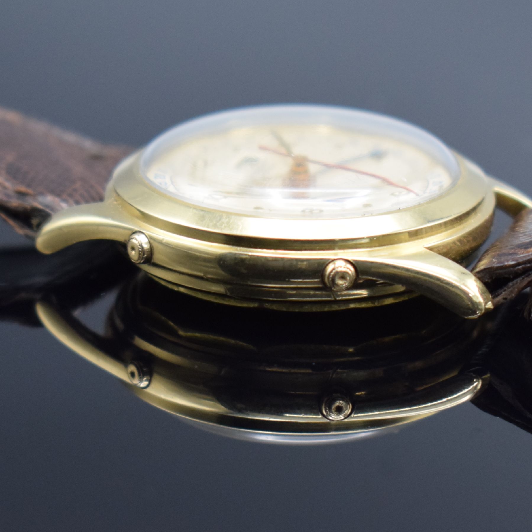 Detail e: PRAESENT Automatik seltene hochwertige Armbanduhr mit Vollkalender/Mondphase in GG 750/000, Schweiz um 1945, Hammerautomatik, verschr. Geh., silb. ...