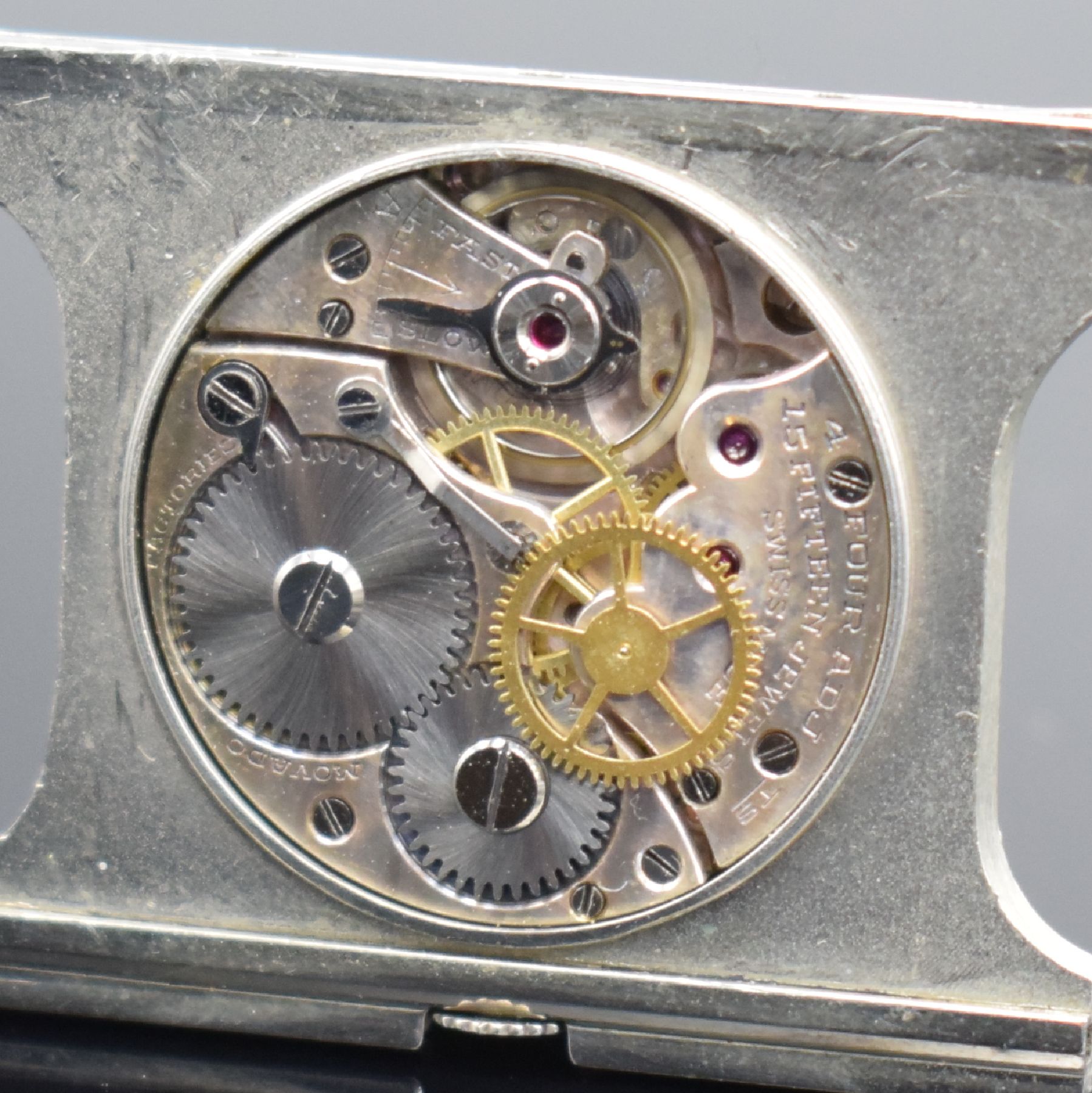 Detail g: MOVADO Ermeto Reiseührchen mit Zentralsekunde, Schweiz um 1945, Aufzug durch öffnen & schließen des Geh., Leder-bez. Nickelgeh. leicht besch., ...
