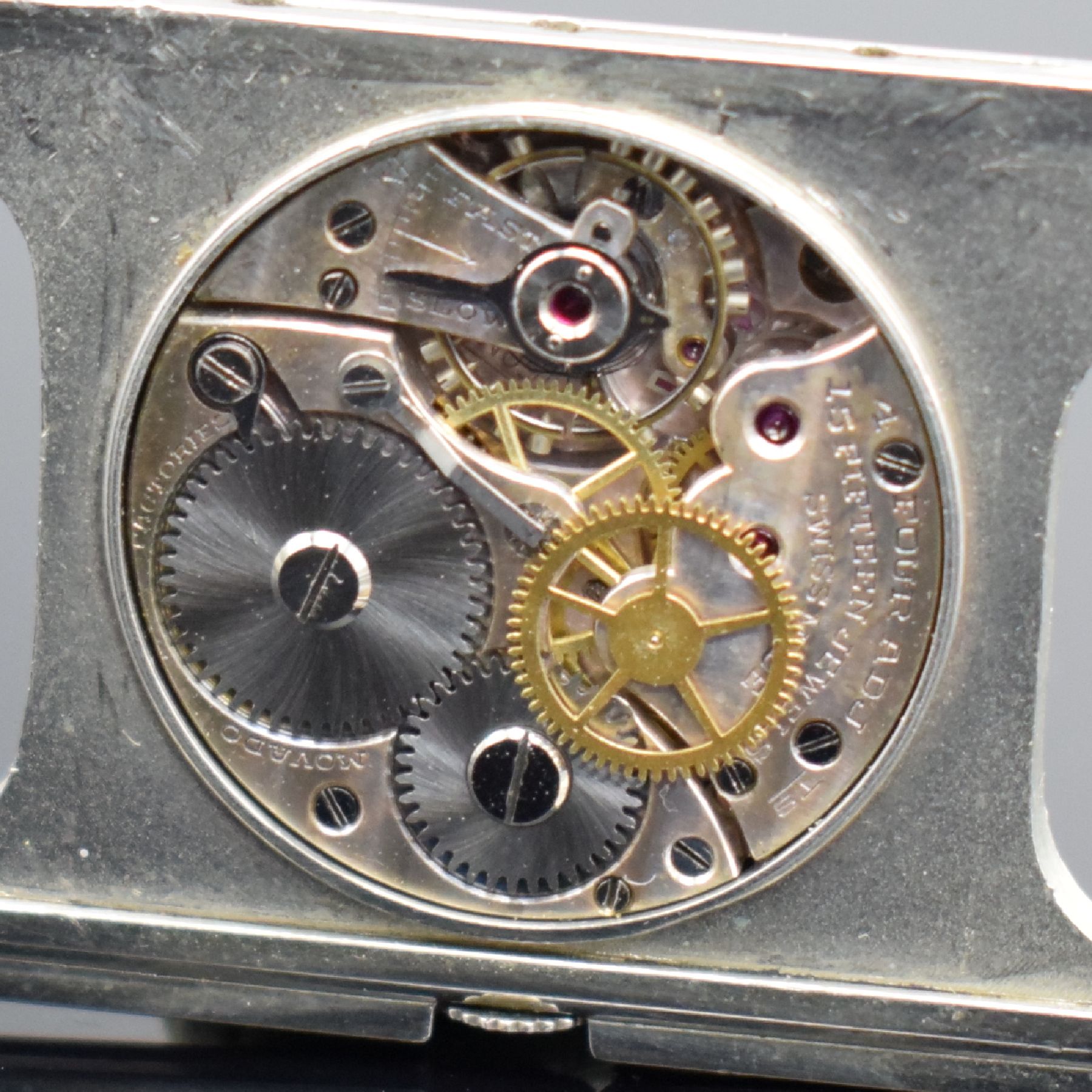 Detail j: MOVADO Ermeto Reiseührchen mit Zentralsekunde, Schweiz um 1945, Aufzug durch öffnen & schließen des Geh., Leder-bez. Nickelgeh. leicht besch., ...