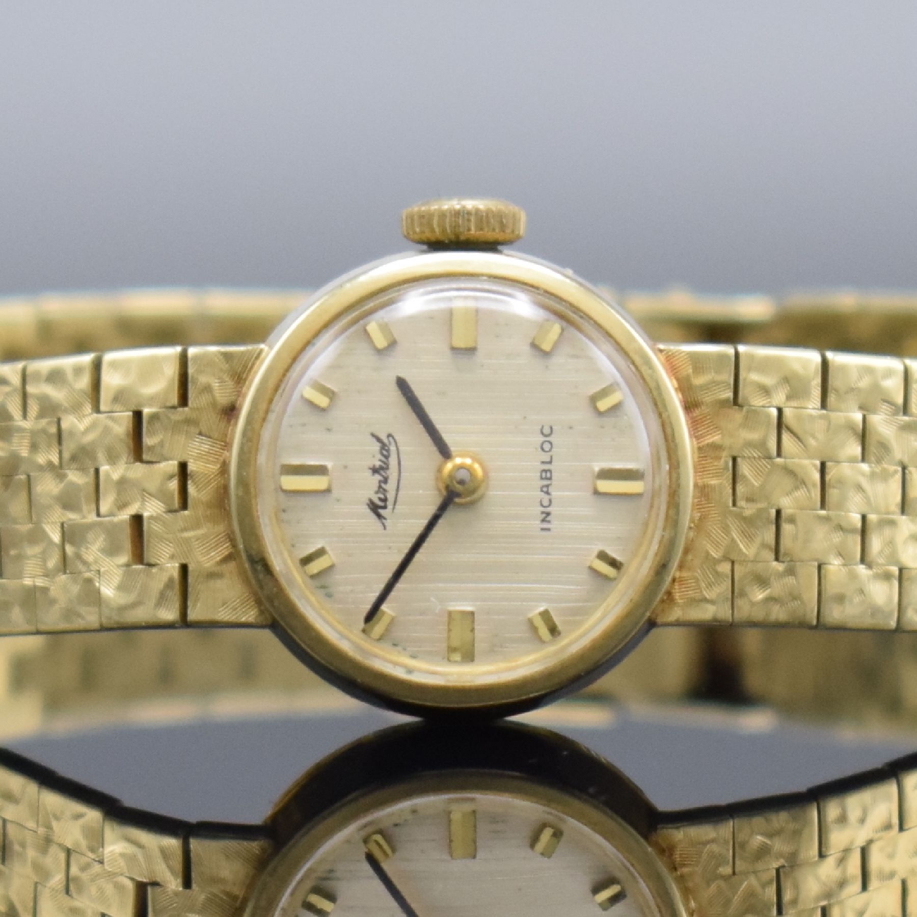 Detail a: MONTRIAL Damenarmbanduhr in GG 585/000, Schweiz um 1965, Handaufzug, 2-teil. Geh., Boden aufgedr., Goldband in GG 585/000, silb. Zifferbl. m. aufges. ...