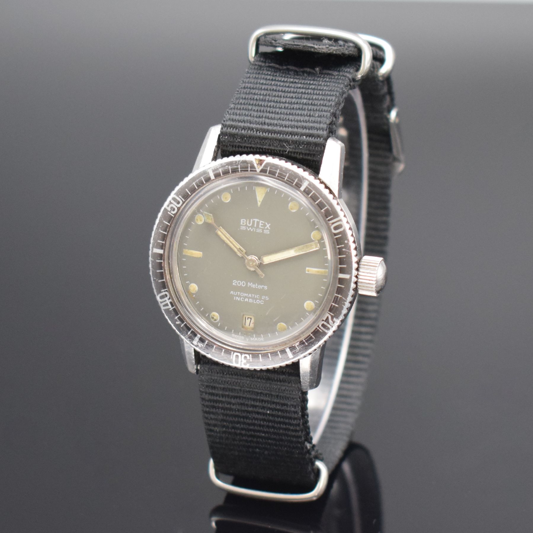 Detail c: BUTEX / BWC Armbanduhr im Taucherdesign in Stahl Referenz 713008, Schweiz um 1965, Automatik, Boden & Krone verschr., Lünette m. 60er Teilung beids. ...