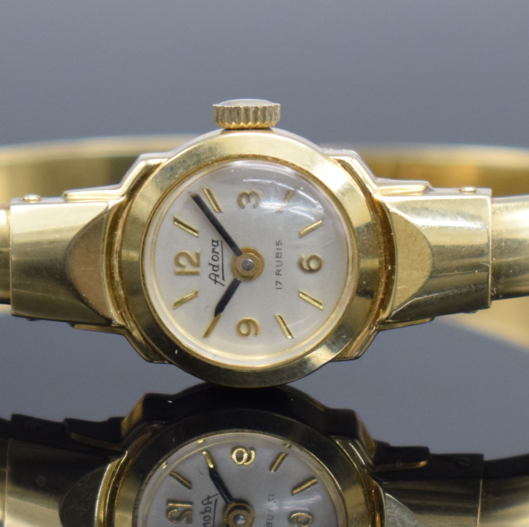 Detail a: Damenspangenuhr signiert ADORA in GG 585/000, Schweiz um 1960, quarz, Boden aufgedr., Quarzwerk später auf Kundenwunsch, silb. Zifferbl. m. gold. ...