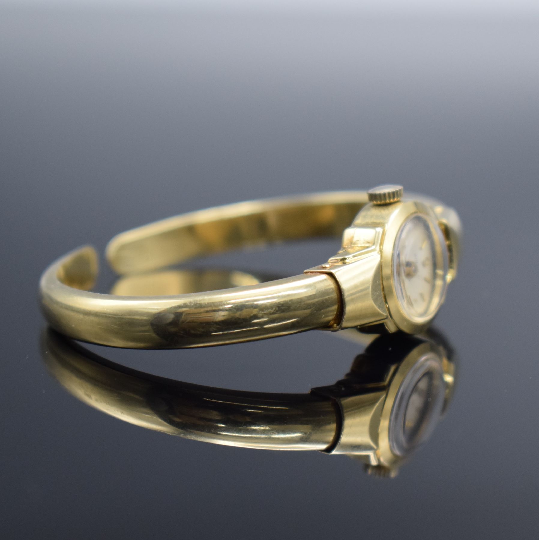 Detail f: Damenspangenuhr signiert ADORA in GG 585/000, Schweiz um 1960, quarz, Boden aufgedr., Quarzwerk später auf Kundenwunsch, silb. Zifferbl. m. gold. ...