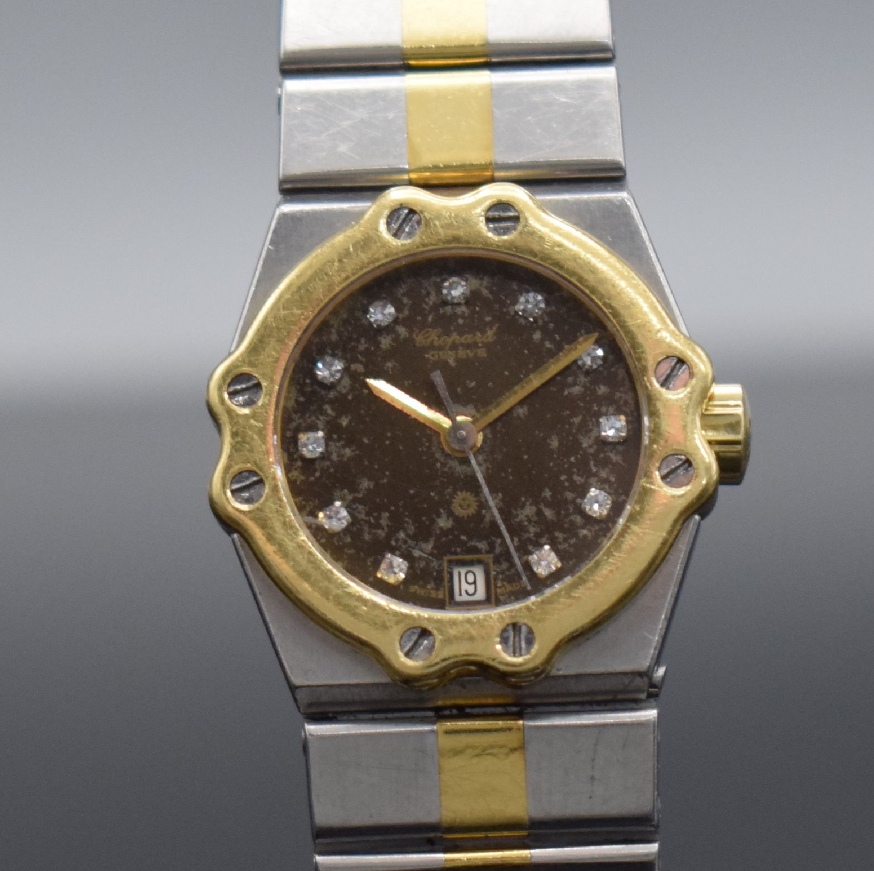 Detail c: CHOPARD St. Moritz Damenarmbanduhr Referenz 8024, Schweiz um 1990, quarz, Edelstahl & Gold komb., Stülpgeh., 8-fach verschr. Goldlünette, ...