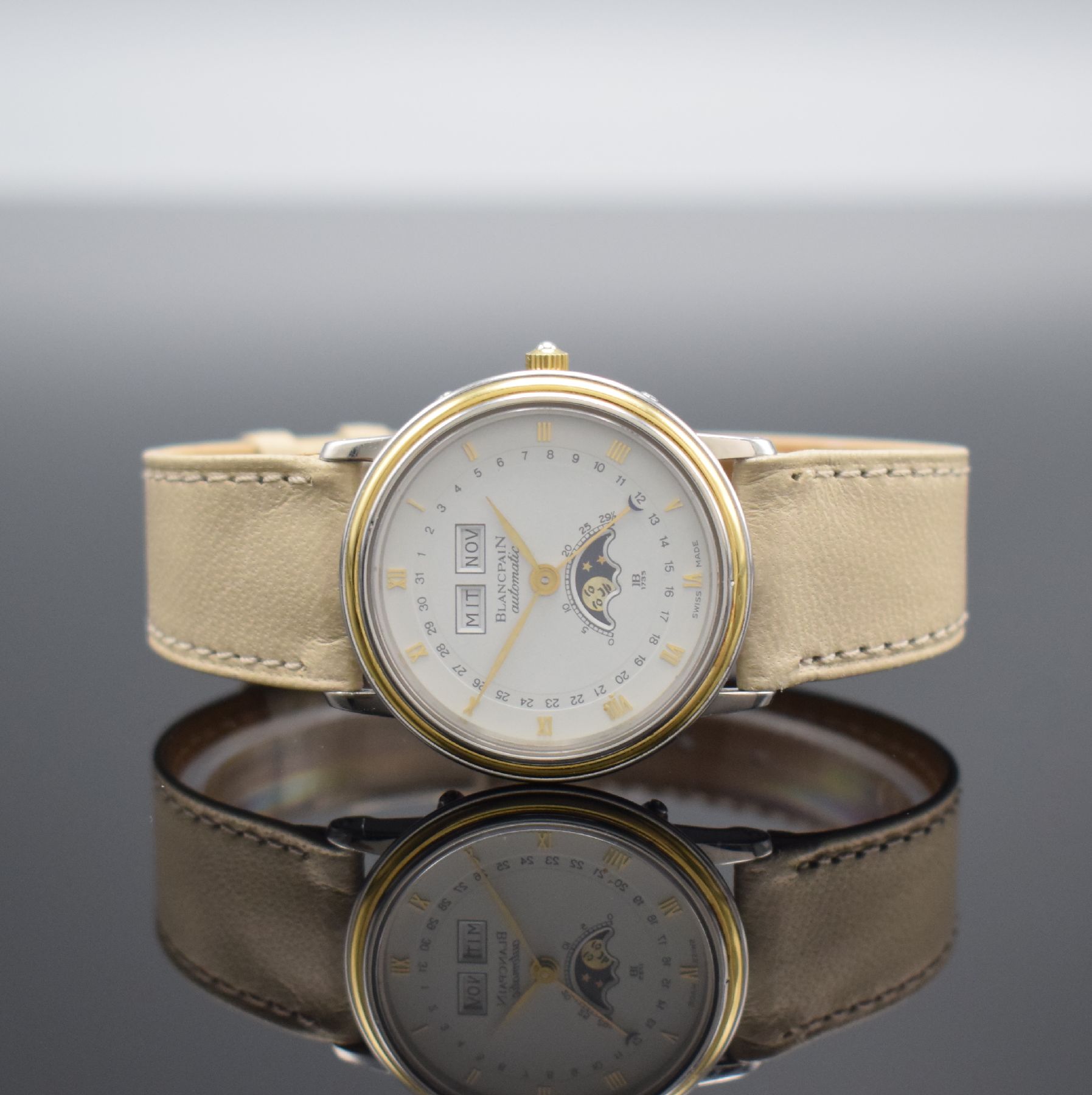 BLANCPAIN Armbanduhr mit Vollkalender Kaliber 953, Schweiz um 1985, Automatik, Edelstahl & Gold komb., Boden aufgedr., Korrekturdr. im Geh. eingel., ...