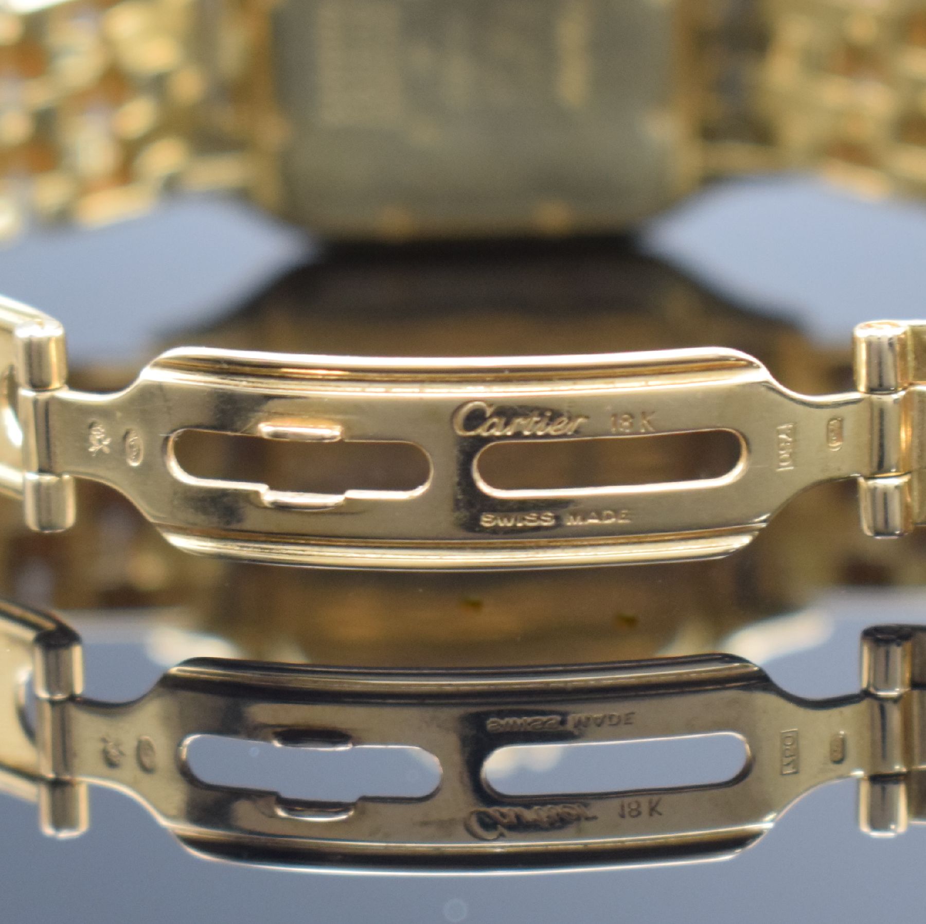 Detail h: CARTIER Panthere Armbanduhr in GG 750/000 mit GG 750/000 Band, Schweiz um 1990, quarz, 2 -teil. Geh., Boden m. Monogramm 8-fach verschr., Gliederband ...