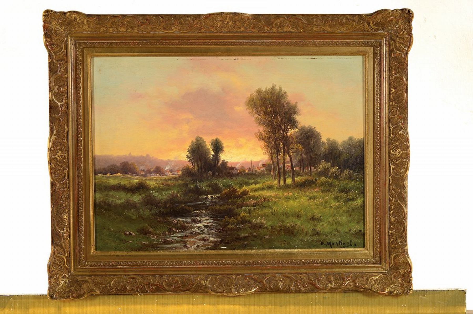 Detail k: E. Martinol, frz. Maler um 1900, Abendstimmung über einer Landschaft mit munterem Bachlauf und einem Dorf im Hintergrund, Öl/Lwd, rechts unten ...