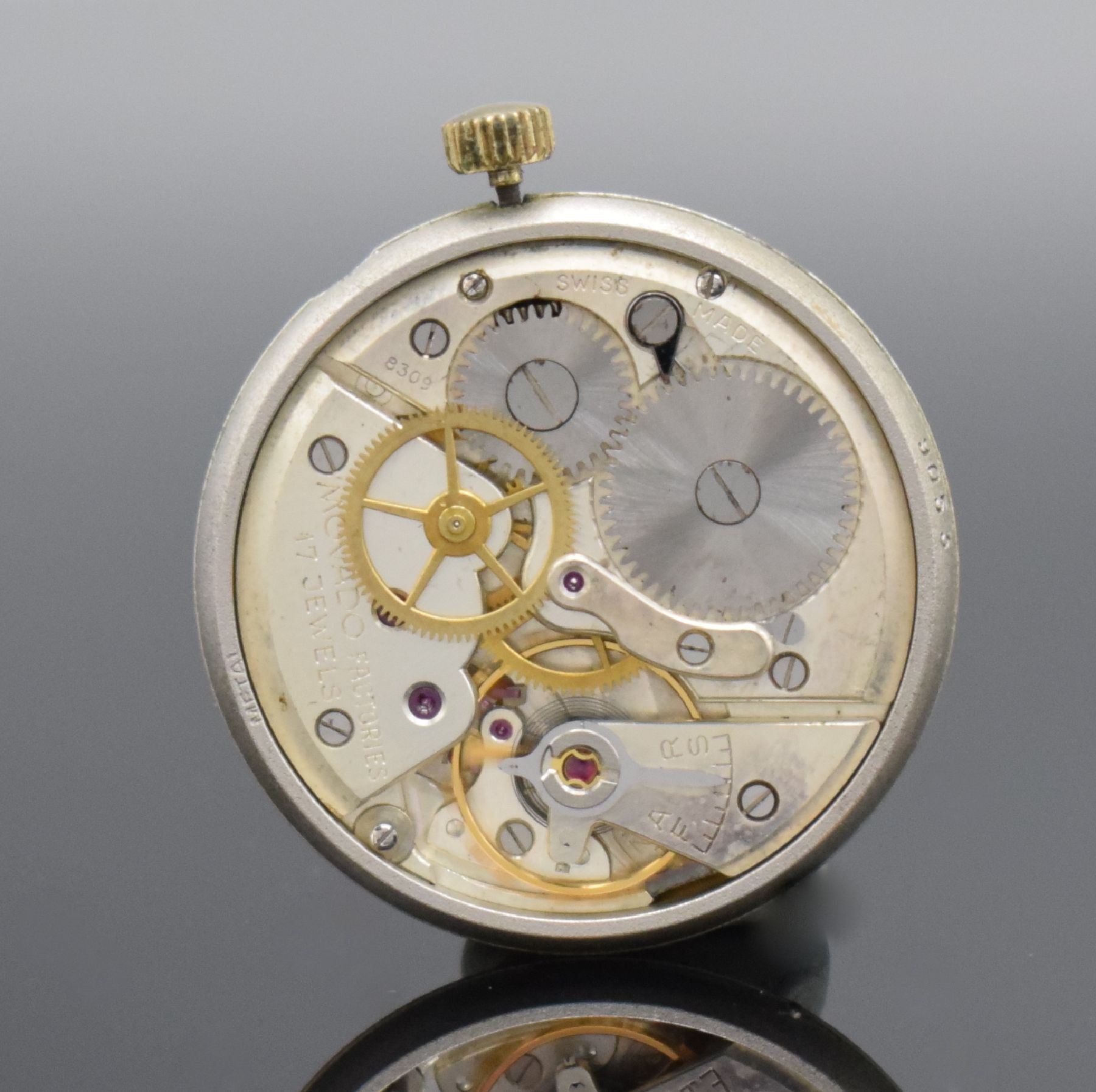 Detail f: MOVADO Herrenarmbanduhr in GG 750/000 mit Kaliber 127, Handaufzug um 1950, Handaufzug, 2-teil. Geh., Boden aufgedr., silb. Zifferbl. m. aufges. ...