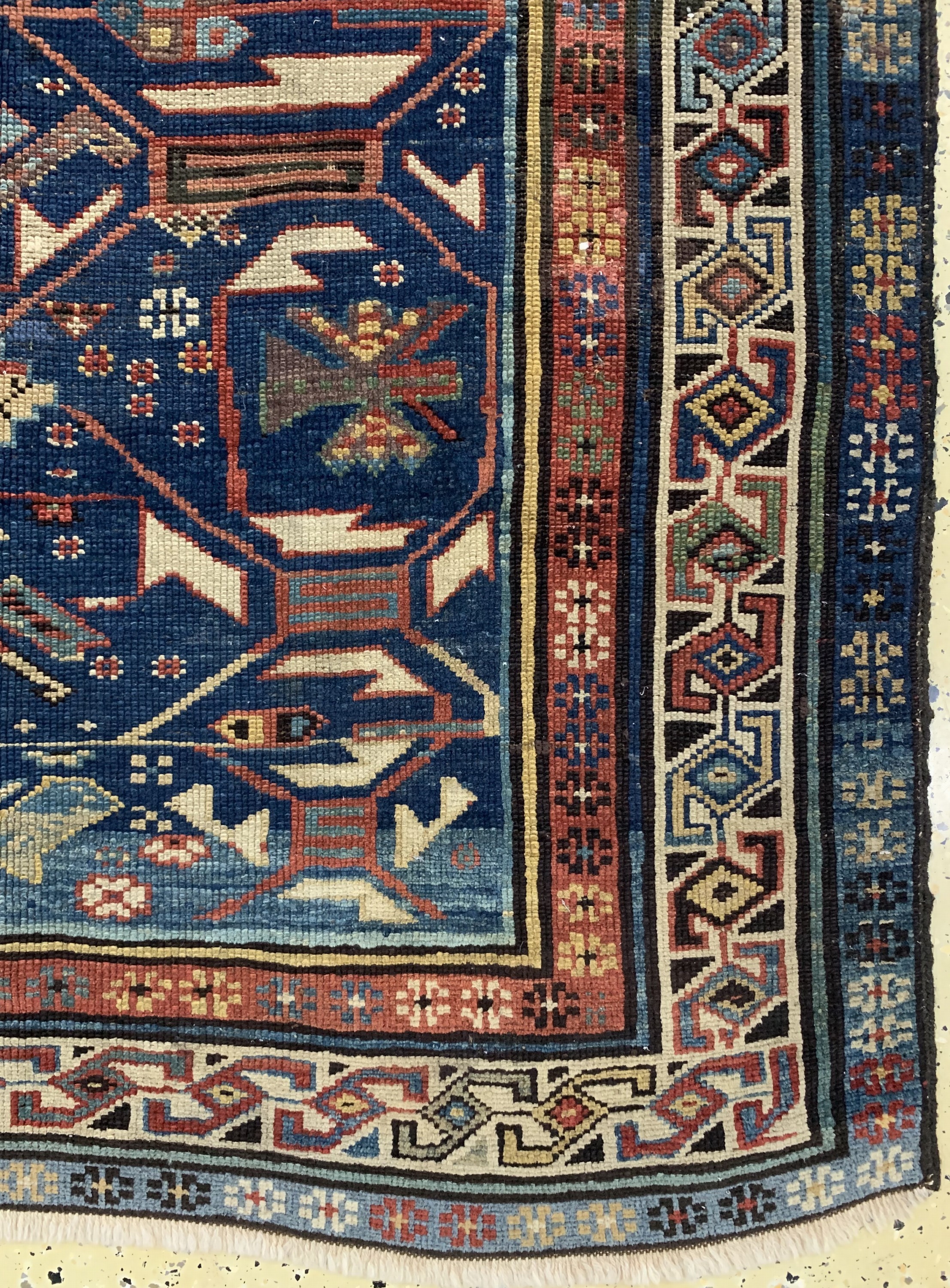 Detail a: Kuba-Schirwan antik, Kaukasus, um 1890, Wolle auf Wolle, ca. 272 x 126 cm, EHZ: 2-3(alte Restaurierungen).