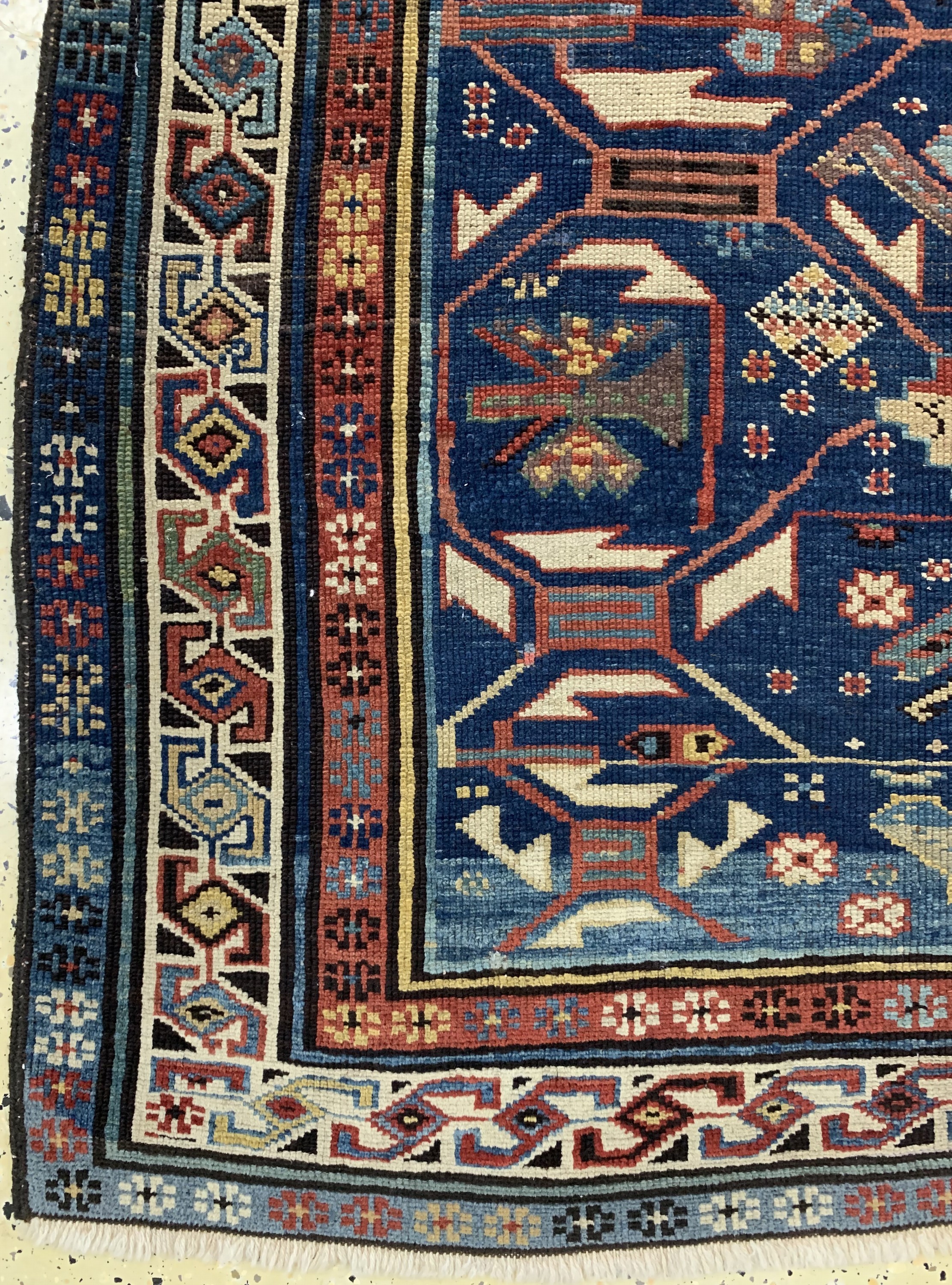Detail b: Kuba-Schirwan antik, Kaukasus, um 1890, Wolle auf Wolle, ca. 272 x 126 cm, EHZ: 2-3(alte Restaurierungen).
