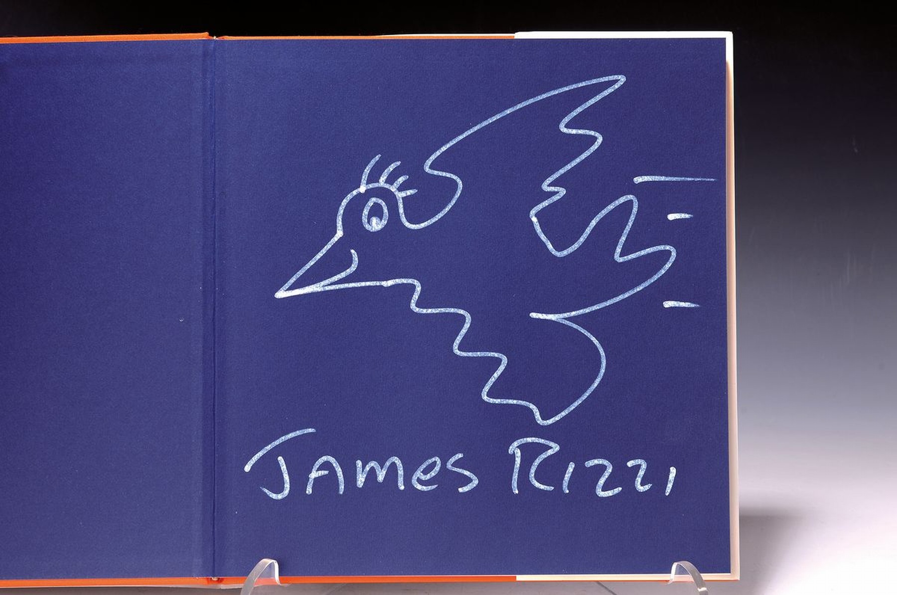 James Rizzi, 1950-2011, Bird, weißer Filzstift auf blauem Papier auf dem Vorsatz- Blatt des Buches: James Rizzi 3-D constructions, John Szoke New ...