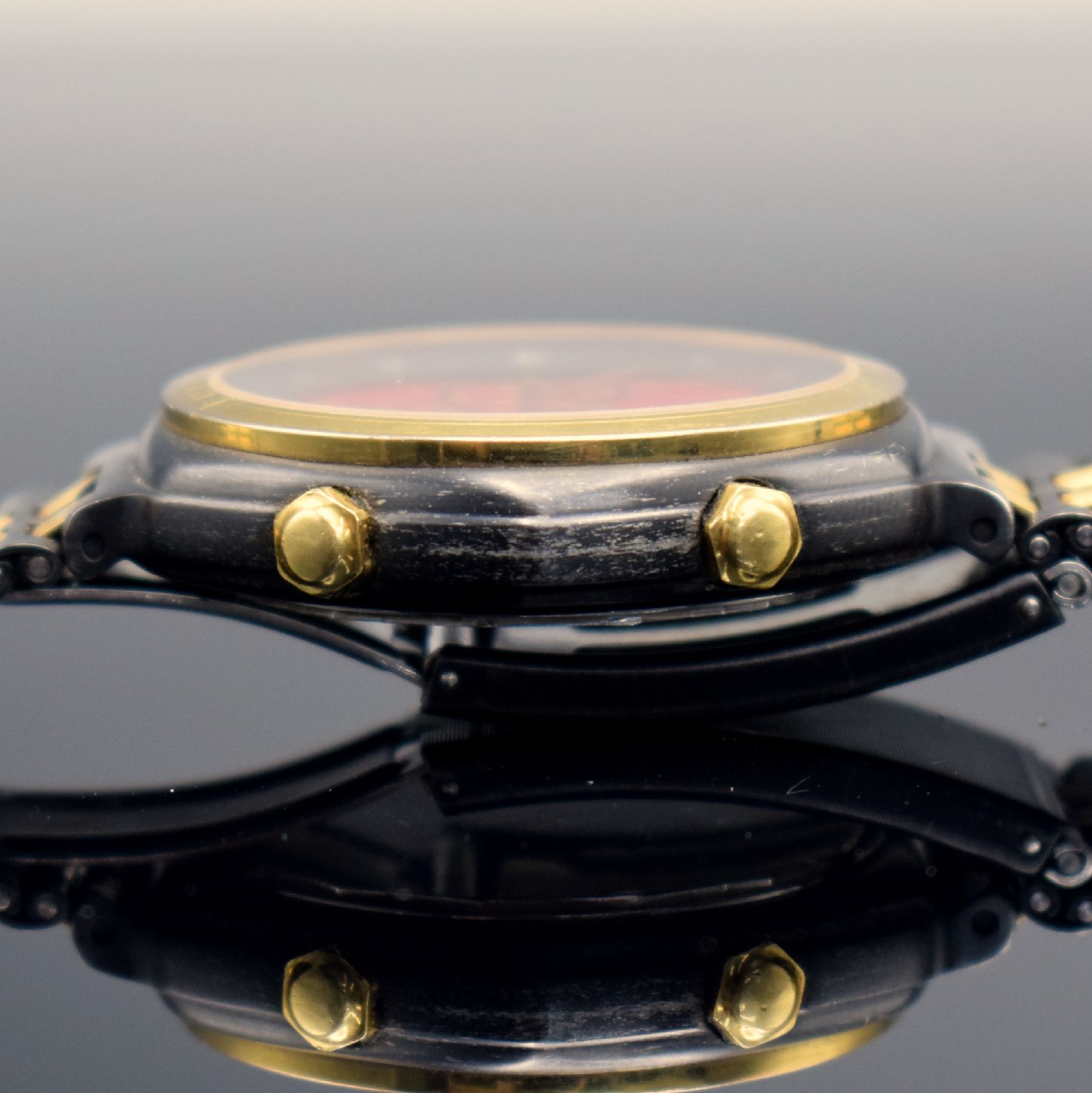 Detail f: FERRARI Formula Herrenchronograph in geschwärztem Stahl, Schweiz um 1990, quarz, Boden verschr., verg. Lünette m. Ferrari- Schriftzug, orig. ...