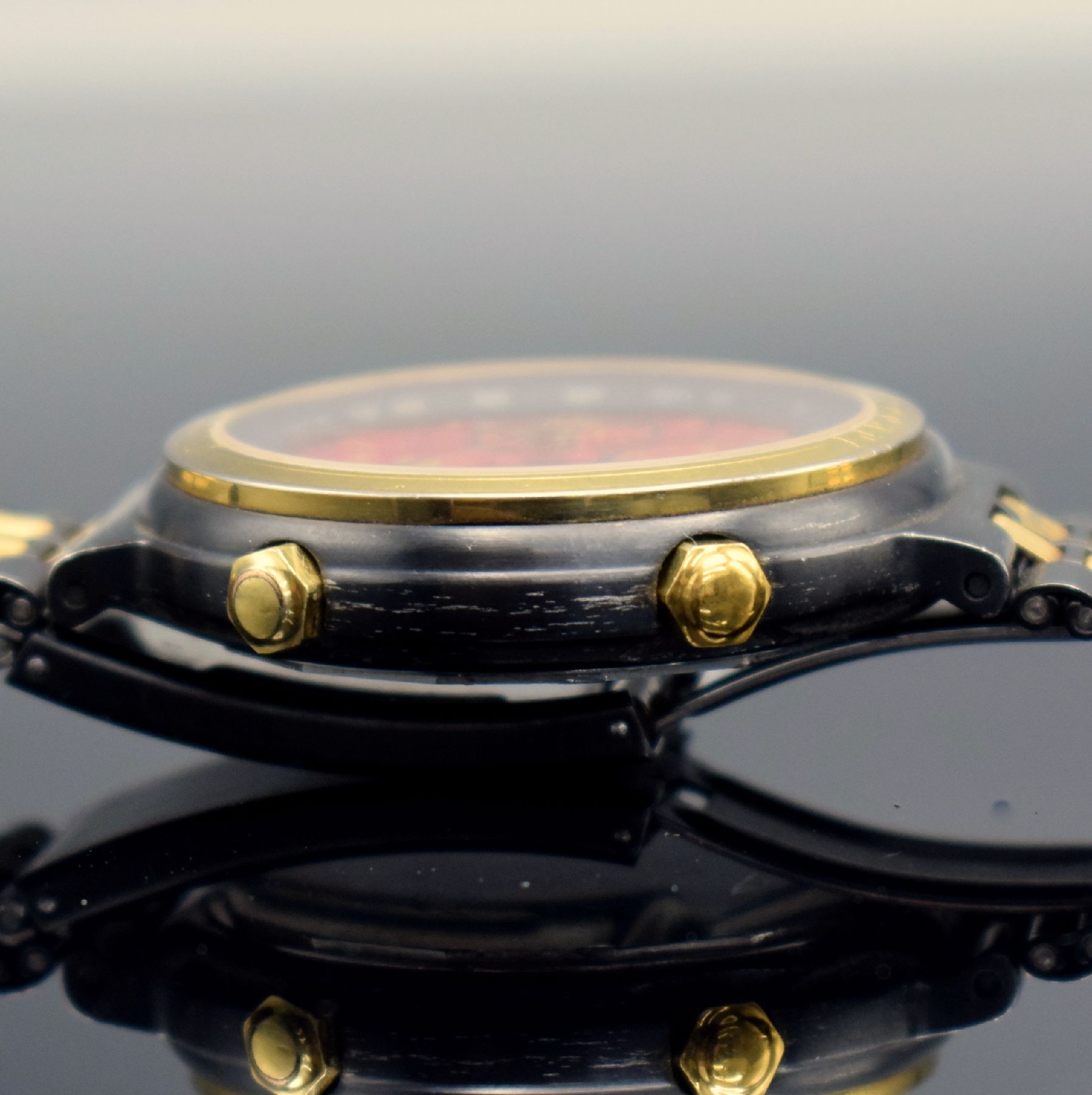 Detail g: FERRARI Formula Herrenchronograph in geschwärztem Stahl, Schweiz um 1990, quarz, Boden verschr., verg. Lünette m. Ferrari- Schriftzug, orig. ...