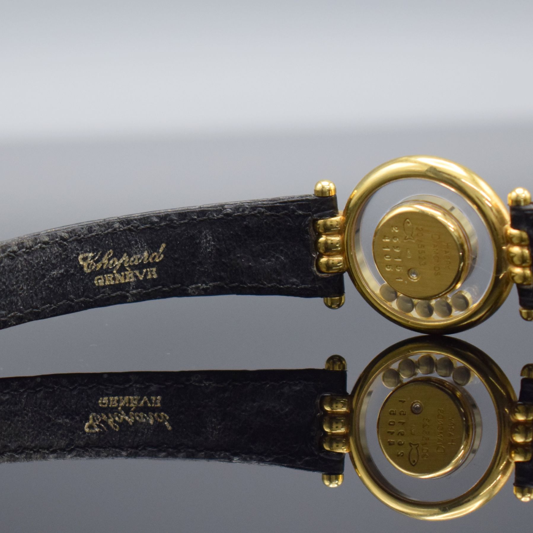 Detail e: CHOPARD Damenarmbanduhr Happy Diamonds in GG 750/000 Referenz 4105, quarz, orig. Lederband m. orig verg. Dornschl., beids. vergl., 5 bewegl. ...
