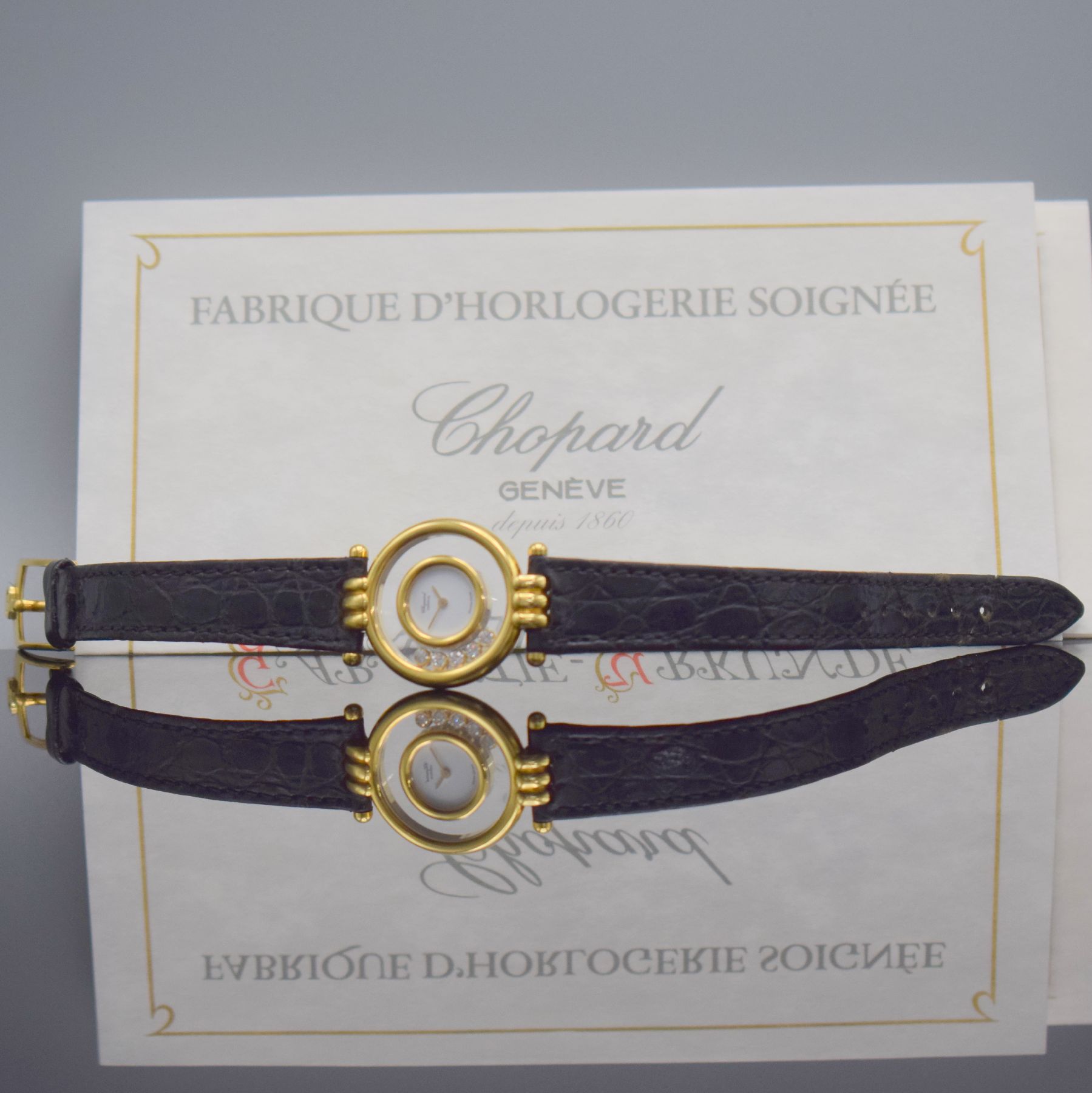 Detail h: CHOPARD Damenarmbanduhr Happy Diamonds in GG 750/000 Referenz 4105, quarz, orig. Lederband m. orig verg. Dornschl., beids. vergl., 5 bewegl. ...
