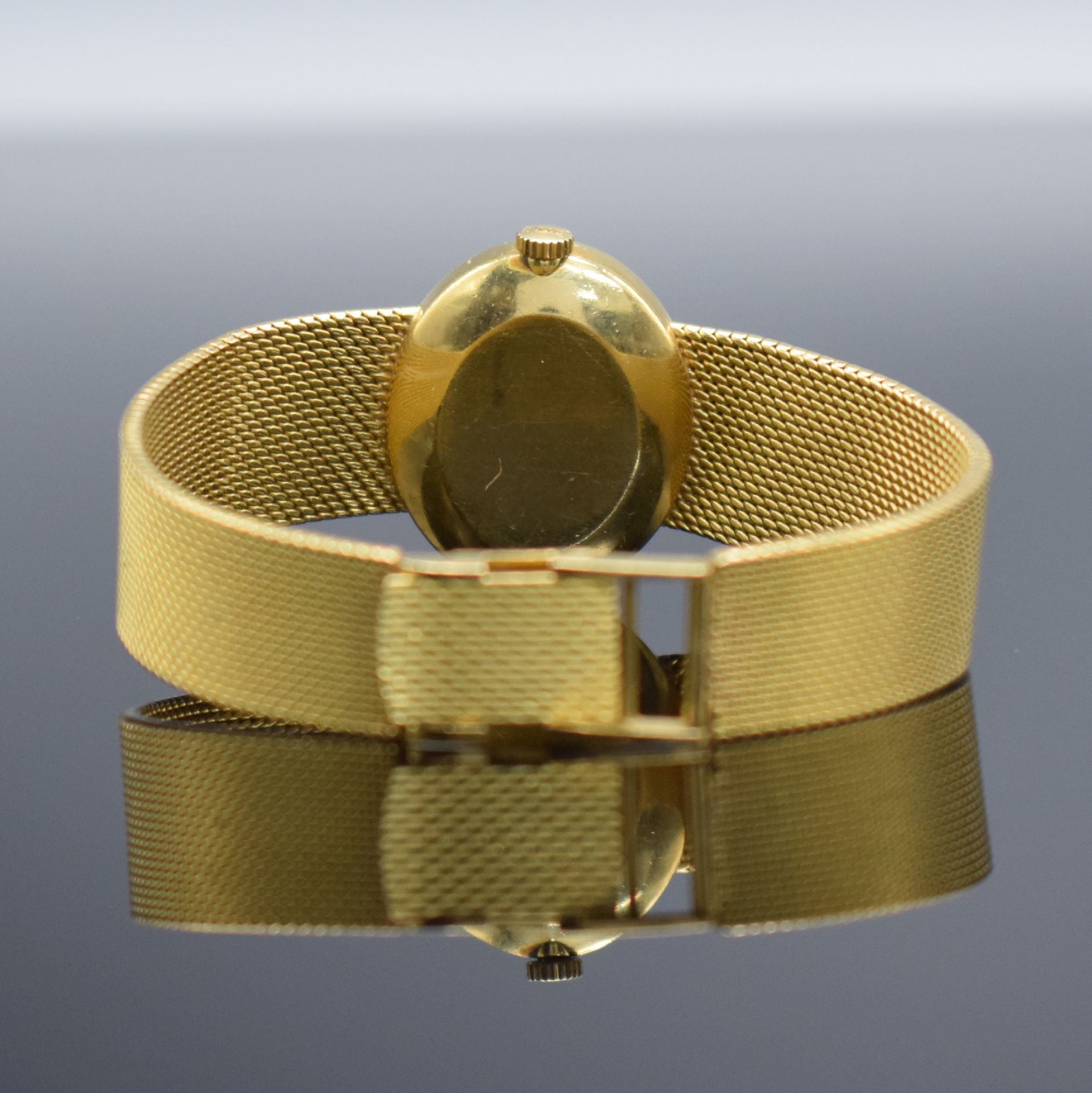 Detail e: CHOPARD Damenarmbanduhr in GG 750/000, Handaufzug, Schweiz um 1975, 2-teil. Geh., Boden aufgedr., Milanaiseband, verg. Zifferbl. m. röm. Std. l. ...