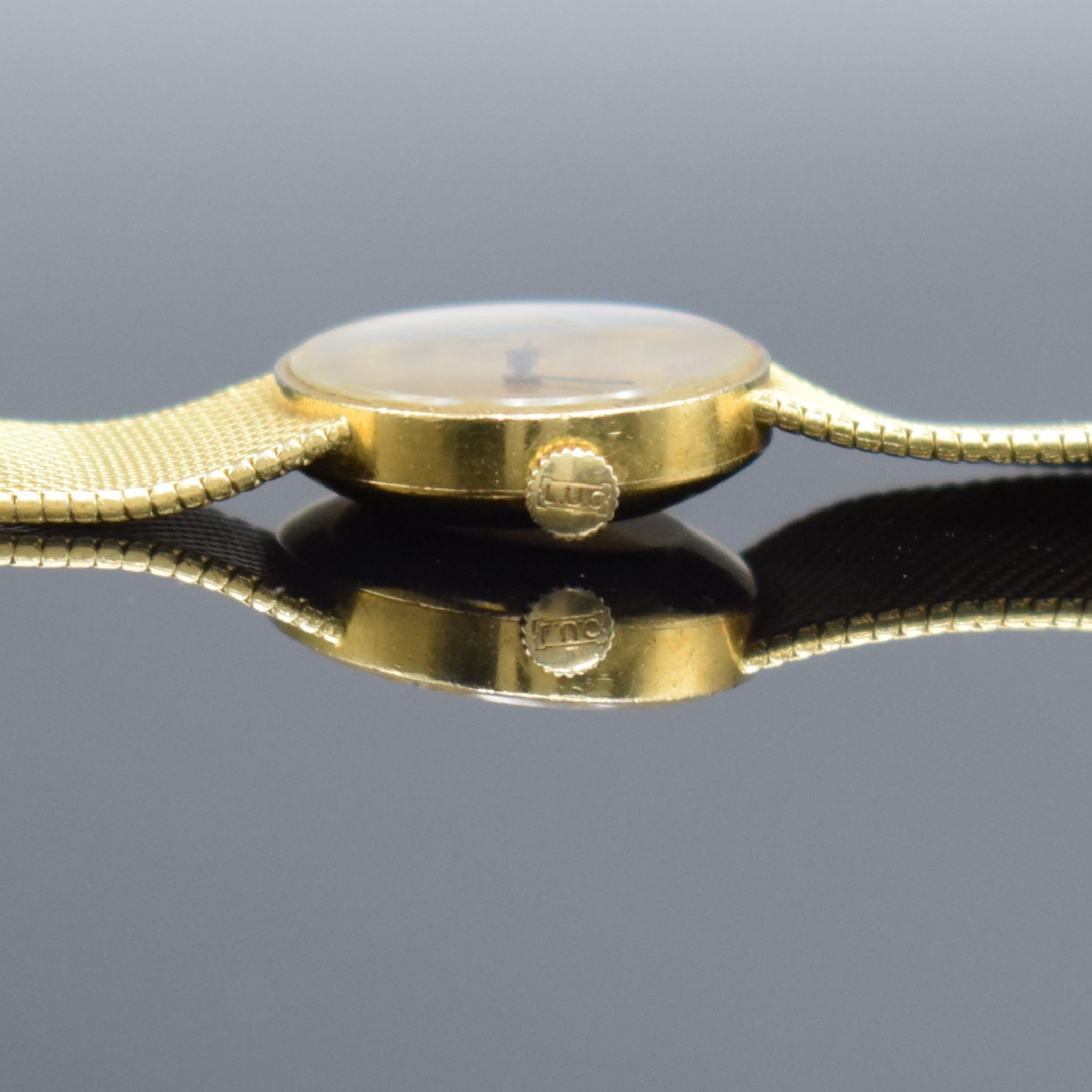 Detail g: CHOPARD Damenarmbanduhr in GG 750/000, Handaufzug, Schweiz um 1975, 2-teil. Geh., Boden aufgedr., Milanaiseband, verg. Zifferbl. m. röm. Std. l. ...