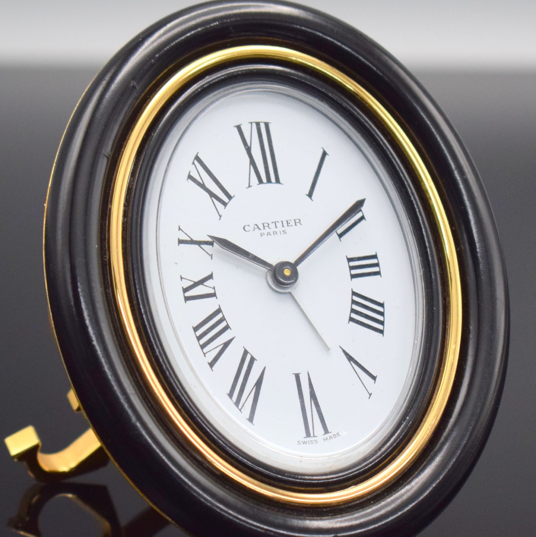 Detail b: CARTIER Paris Tischwecker Baignoire Referenz 7509, Schweiz 1980er Jahre, Handaufzug, verg. Messinggeh. z. T. schwarz lackiert, Lack. teils besch., ...