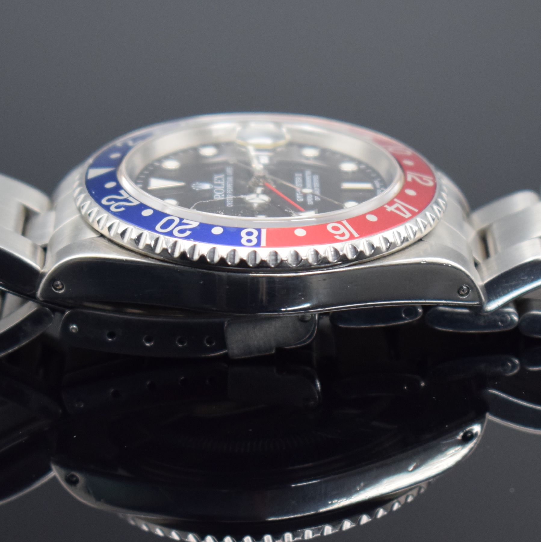 Detail i: ROLEX Herrenarmbanduhr Oyster Perpetual Date GMT-Master II Referenz 16710, Automatik, Schweiz um 2000, A-Serie, Chronometer der Superlative in ...