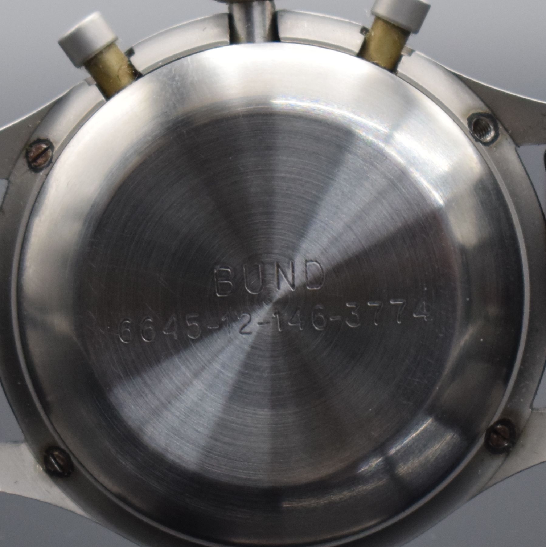 Detail h: HEUER Flieger-Schaltradchronograph der BUNDESWEHR Versorgungs-Nr. 6645-12-146-3774, Schweiz um 1968, Handaufzug, 4-fach verschr. Monocoque-Geh. in ...
