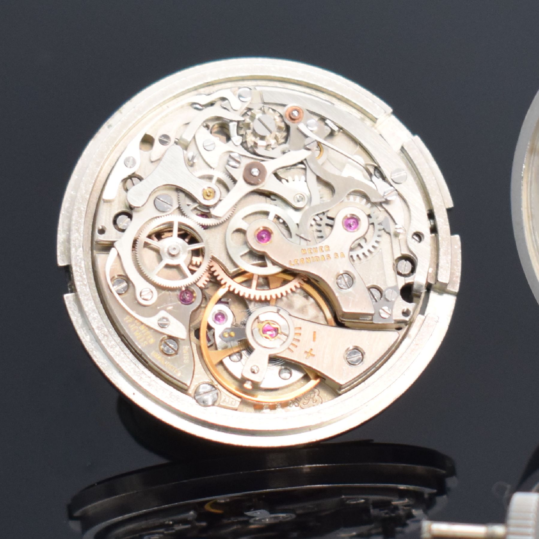 Detail k: HEUER Flieger-Schaltradchronograph der BUNDESWEHR Versorgungs-Nr. 6645-12-146-3774, Schweiz um 1968, Handaufzug, 4-fach verschr. Monocoque-Geh. in ...