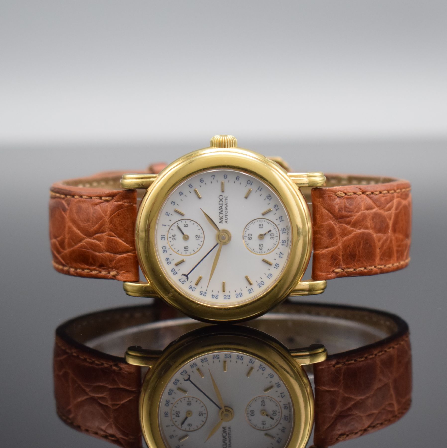 MOVADO 1881 Herrenarmbanduhr in GG 750/000, Schweiz um 1995, Automatik, Ref. 40.B2.870, Boden 6-fach verschr. (1 Schr. zu ers.), orig. Lederband m. ...