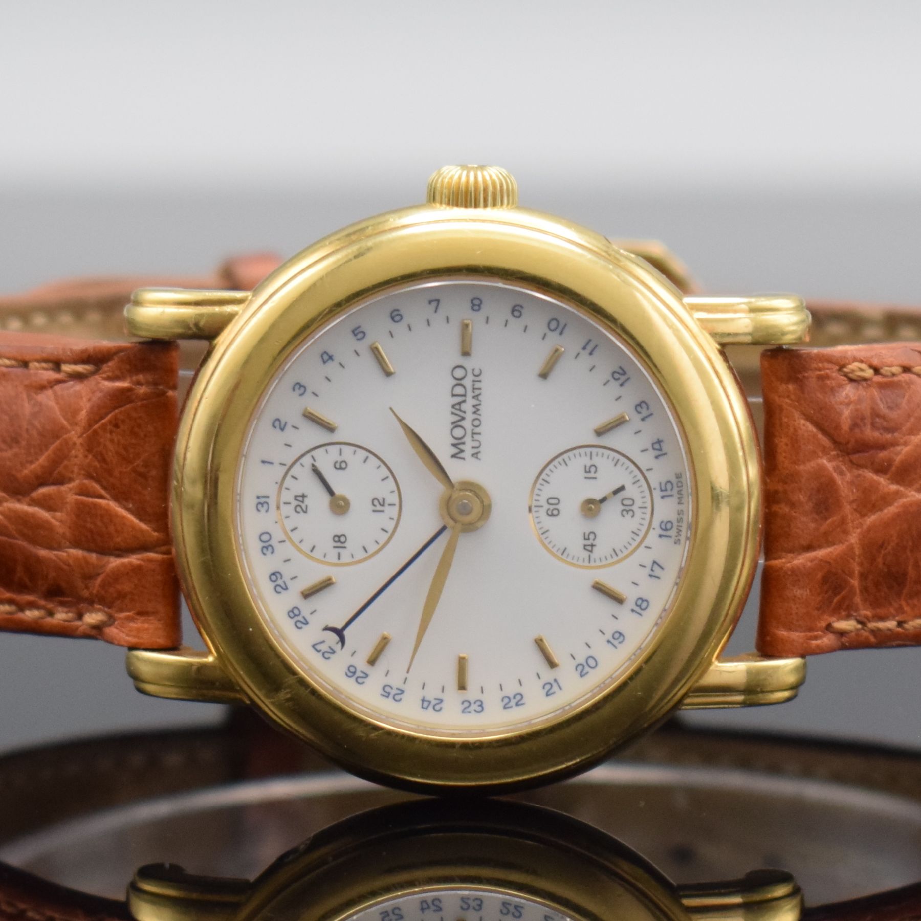 Detail a: MOVADO 1881 Herrenarmbanduhr in GG 750/000, Schweiz um 1995, Automatik, Ref. 40.B2.870, Boden 6-fach verschr. (1 Schr. zu ers.), orig. Lederband m. ...