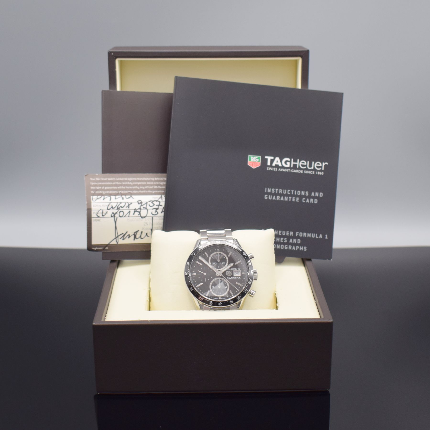 Detail e: TAG HEUER Carrera Calibre 16 Juan Manuel Fangio Herrenarmbanduhr mit Chronograph in Stahl, Automatik, Ref. CV201AJ-0, Boden verschr., orig. ...