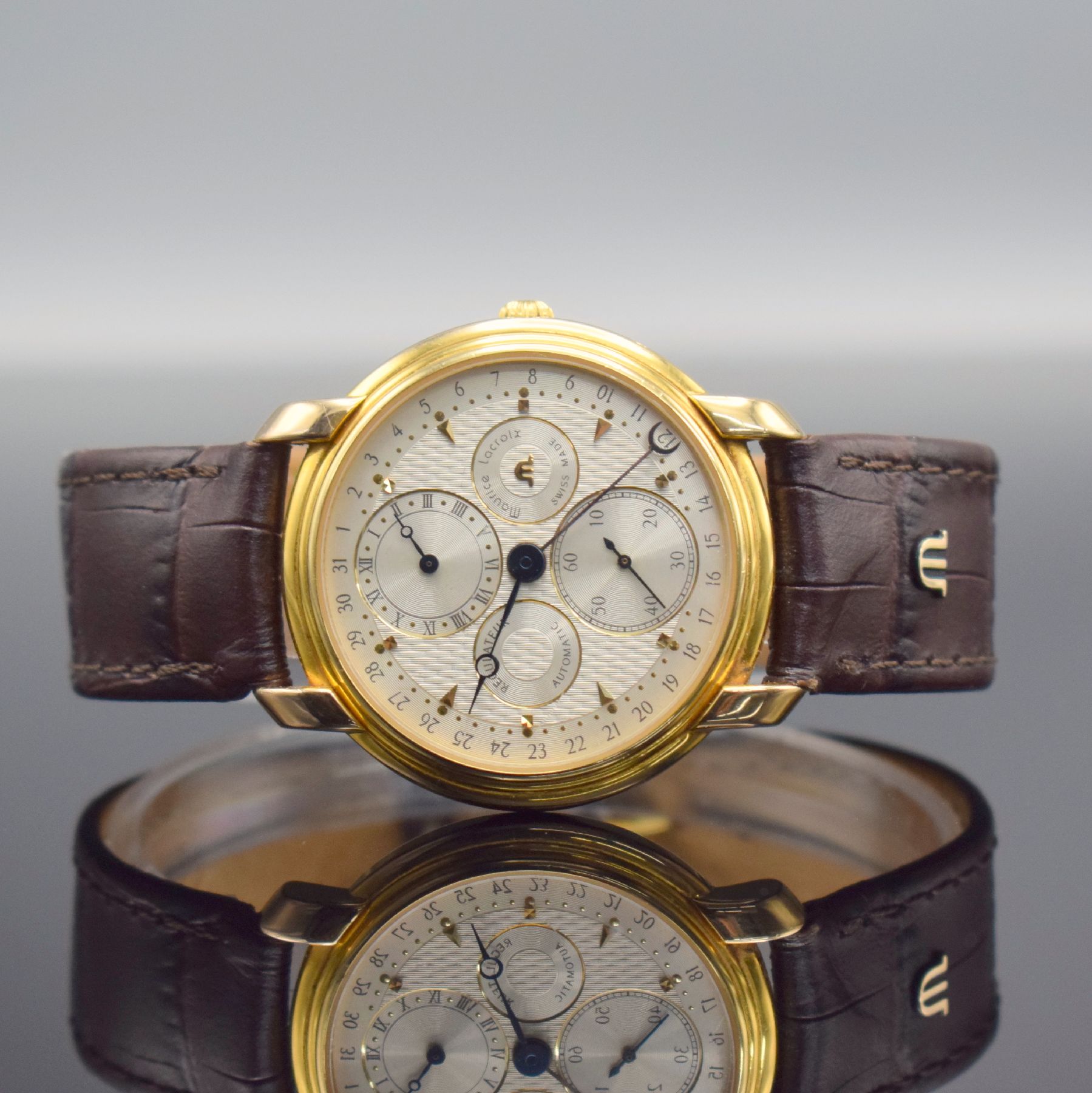 MAURICE LACROIX Regulateur Herrenarmbanduhr, Schweiz um 1995, Automatik, verg. Geh. beids. vergl., Boden aufgedr., Korrekturdr. seitl. im Geh. ...